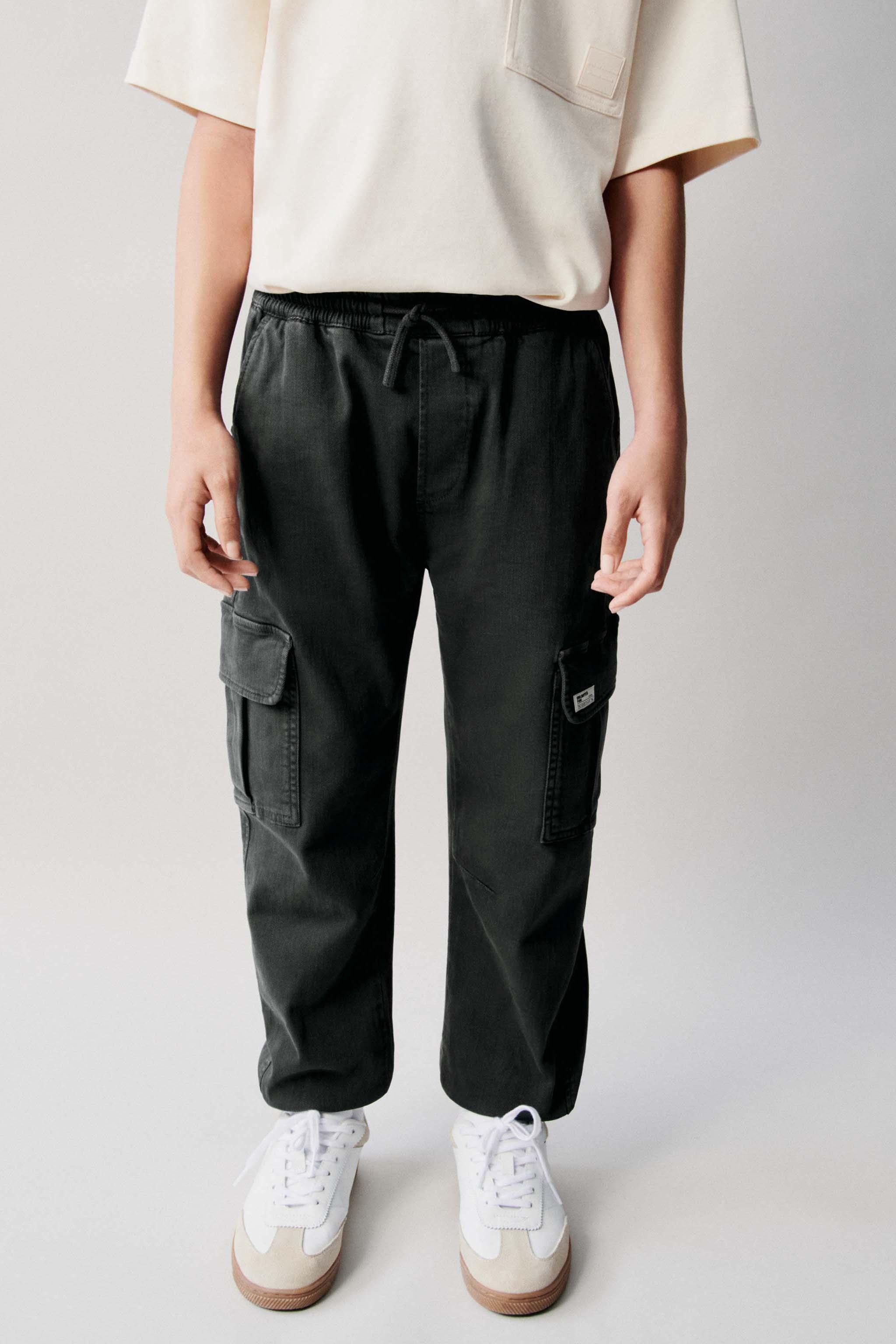 Pantalones blancos niño online zara