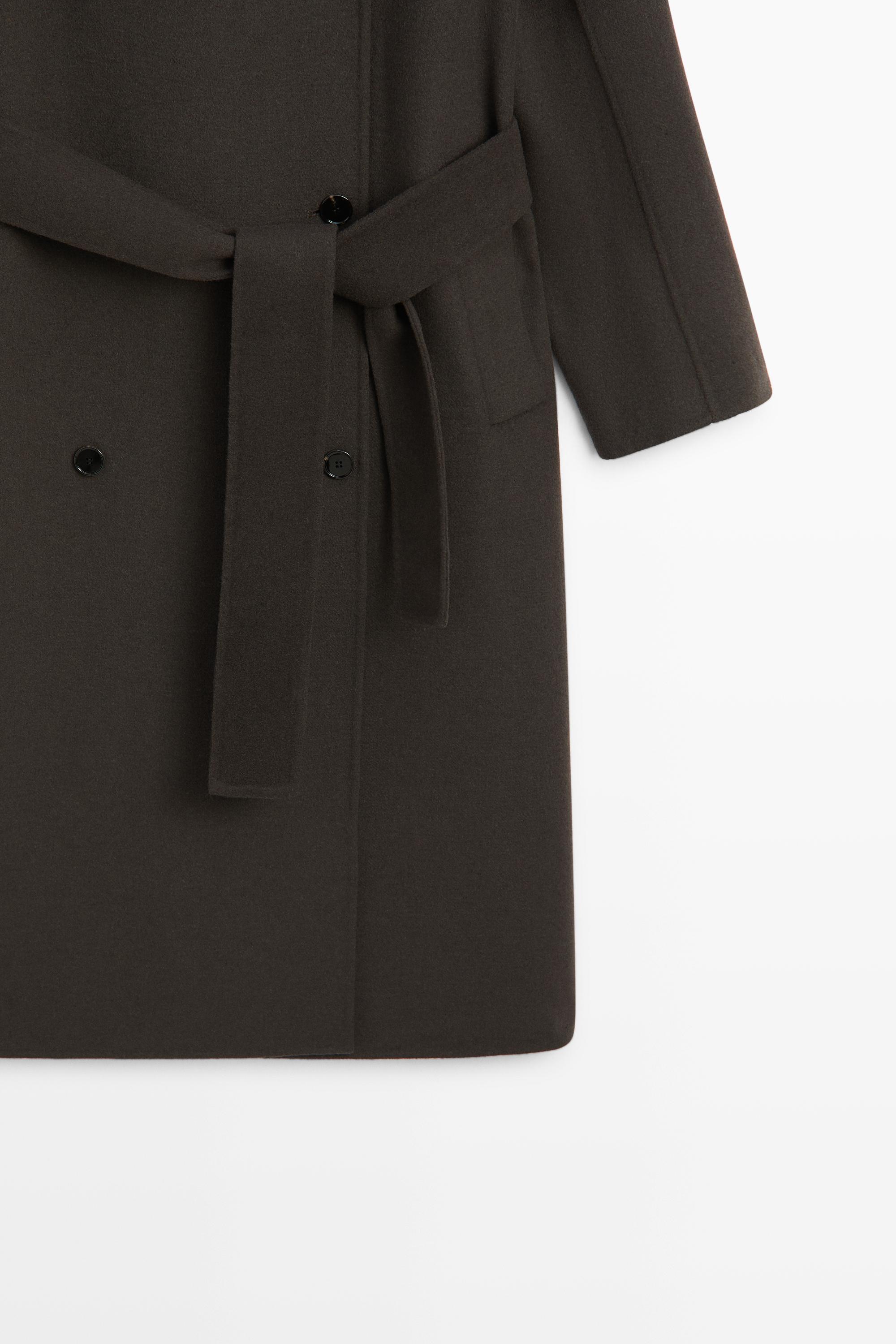 Manteau long croisé détail ceinture