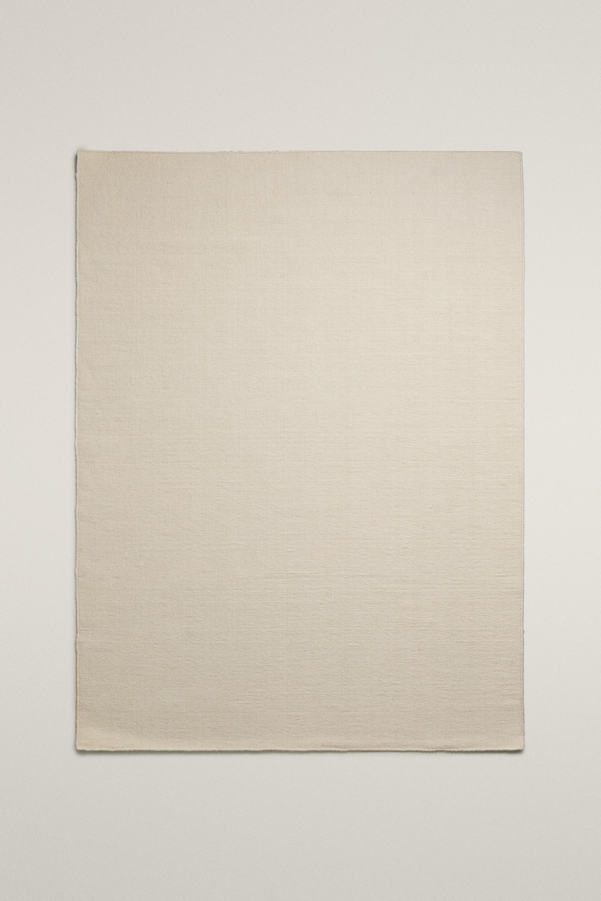 WOOL AREA RUG WITH SCALLOPED LINES