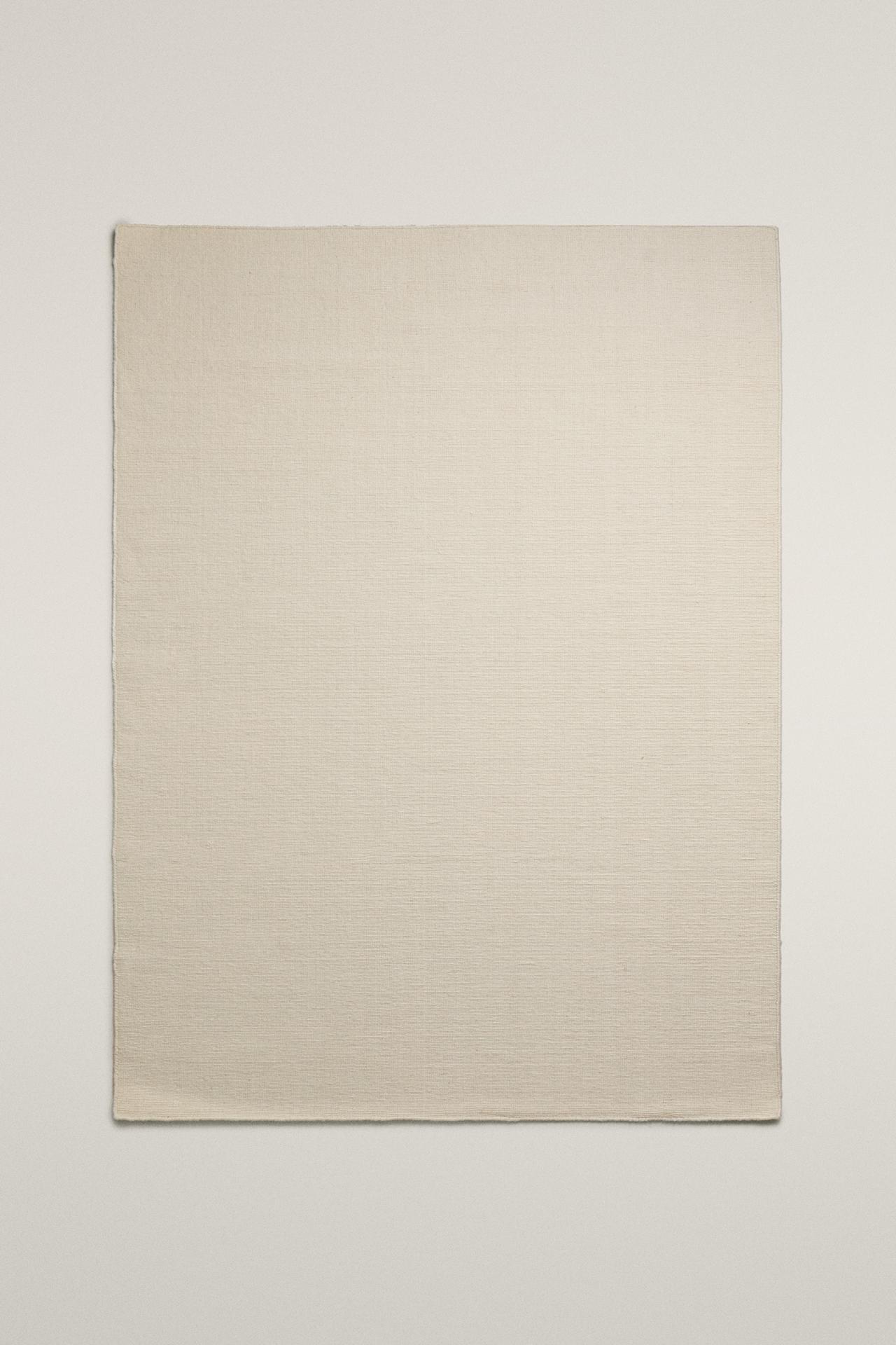 WOOL AREA RUG WITH SCALLOPED LINES — Ecru