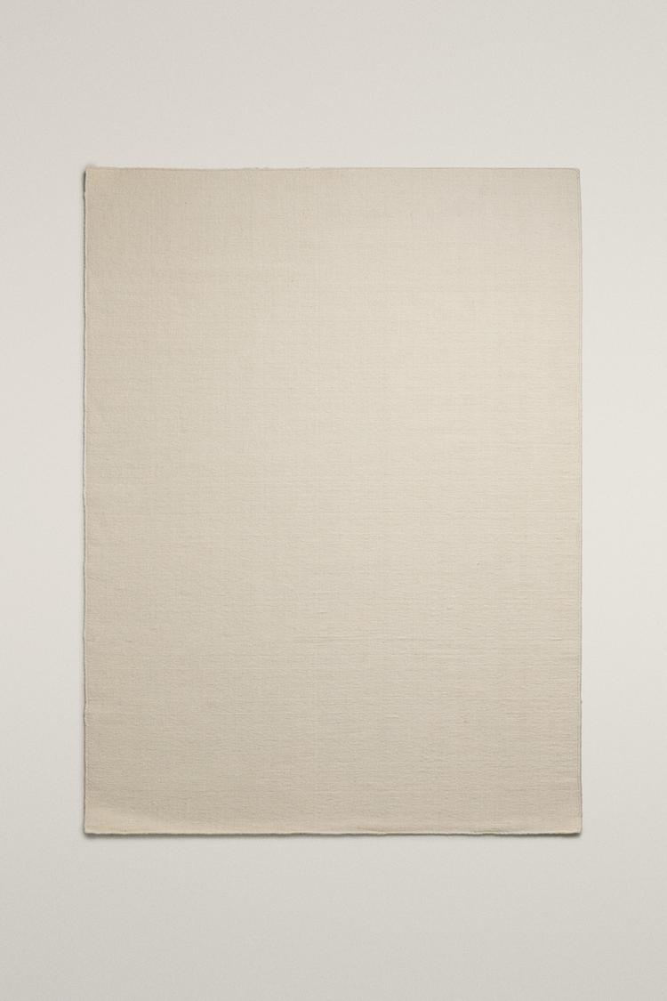 WOOL AREA RUG WITH SCALLOPED LINES — Ecru