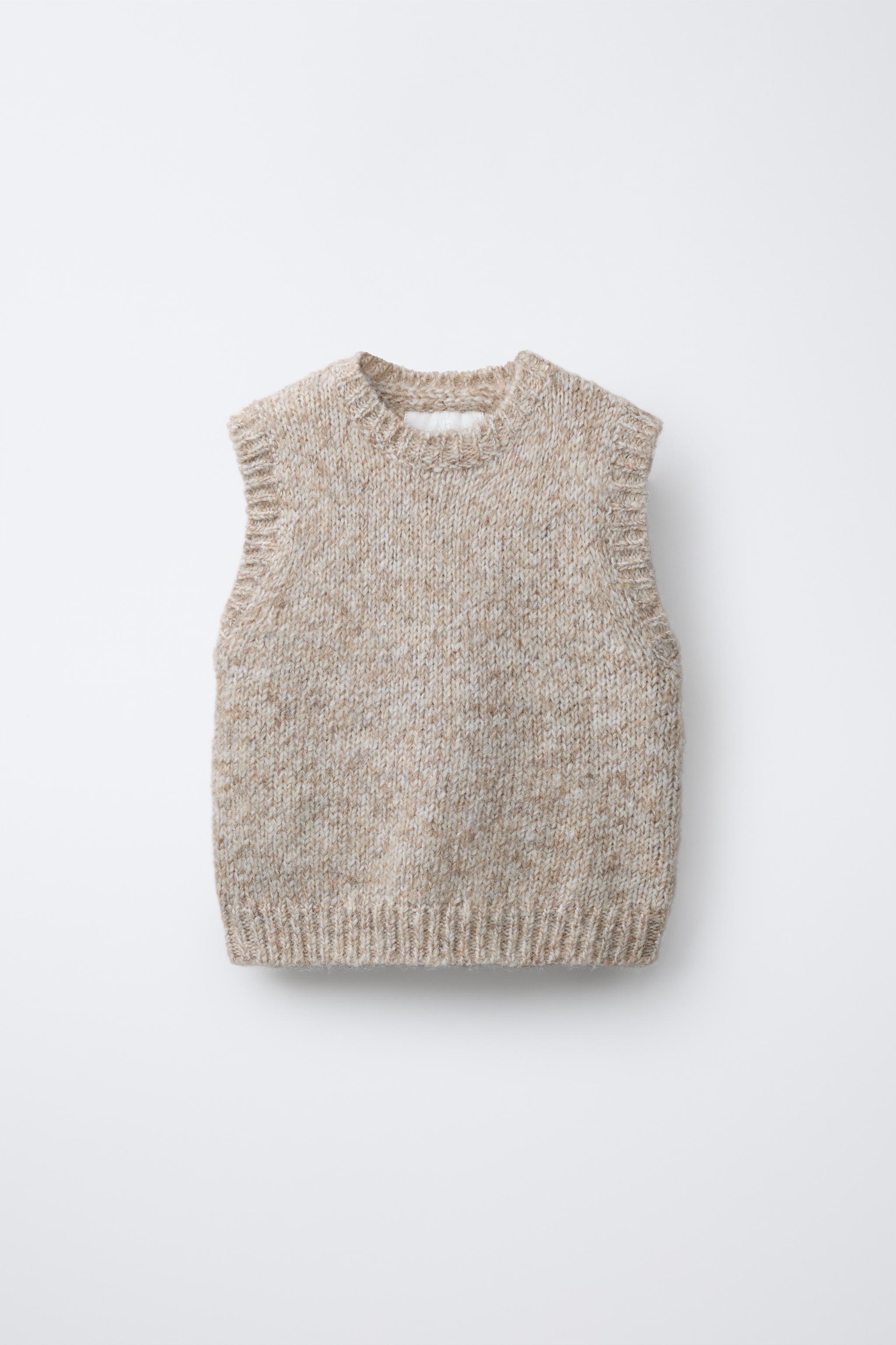 トップス LIGHT SHEER LAYERED KNIT VEST Light and bright layers for summer. Our pink organic-cotton