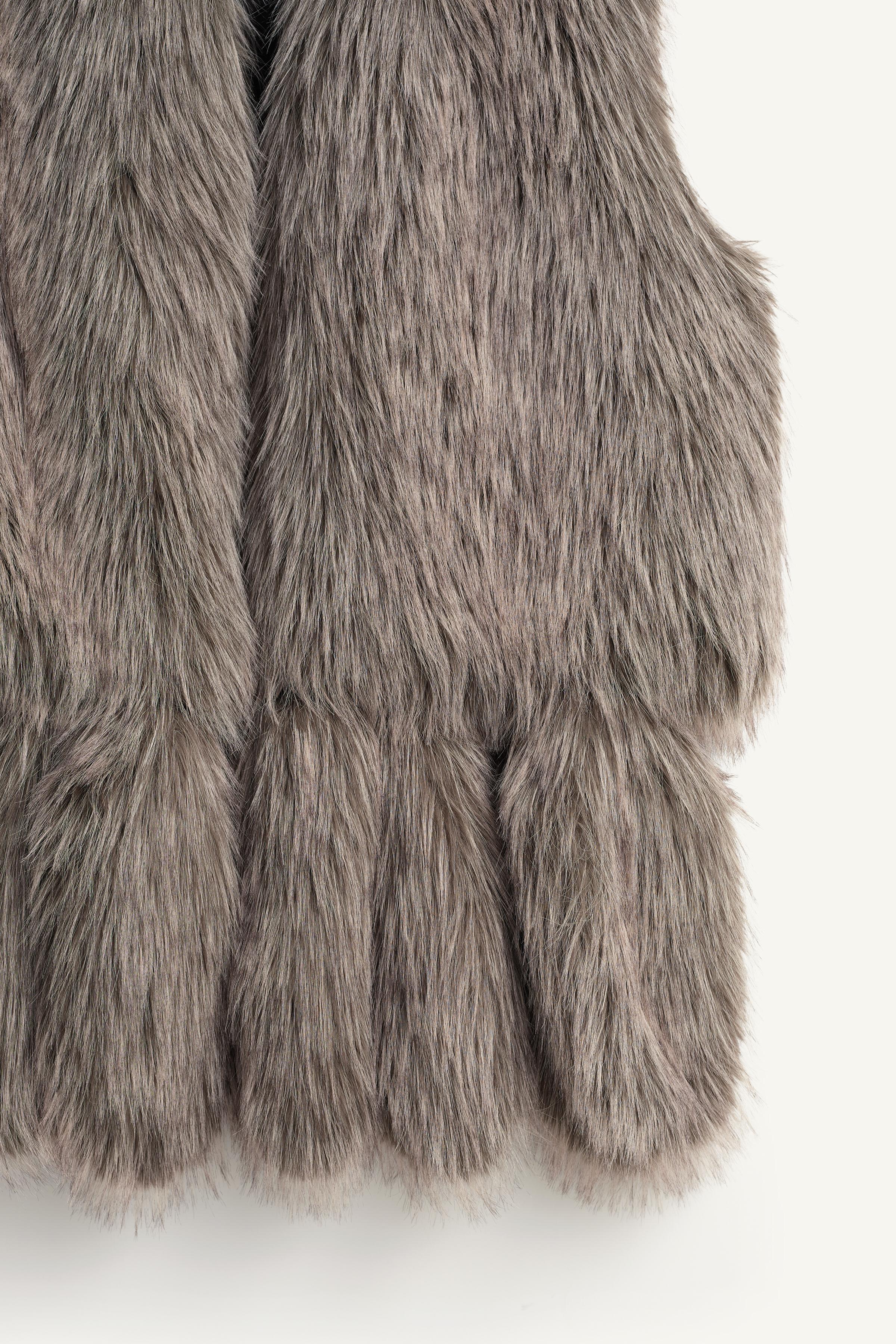 GILET EFFET EFFET FOURRURE FRANGES ÉDITION LIMITÉE