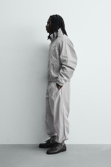 TECHNICAL JOGGING TROUSERS WITH CONTRAST SIDE TAPING - Light grey by Zara