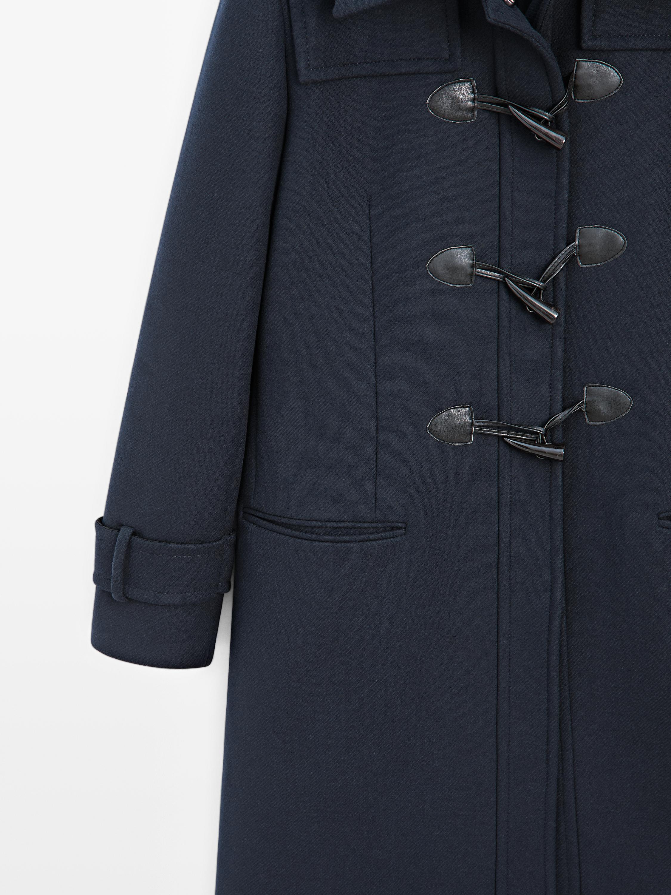 Long coat with toggles