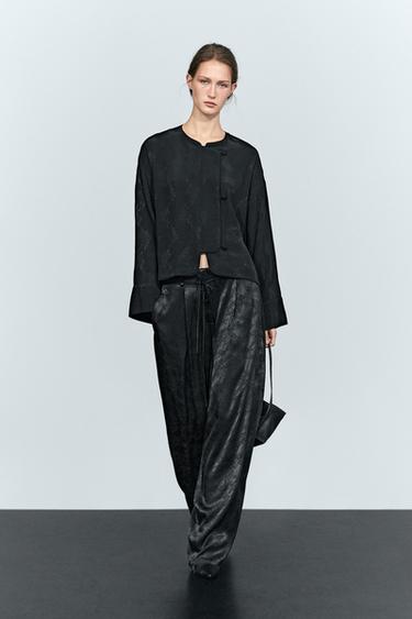 Wide-leg fluid pants with jacquard detail — Black 1