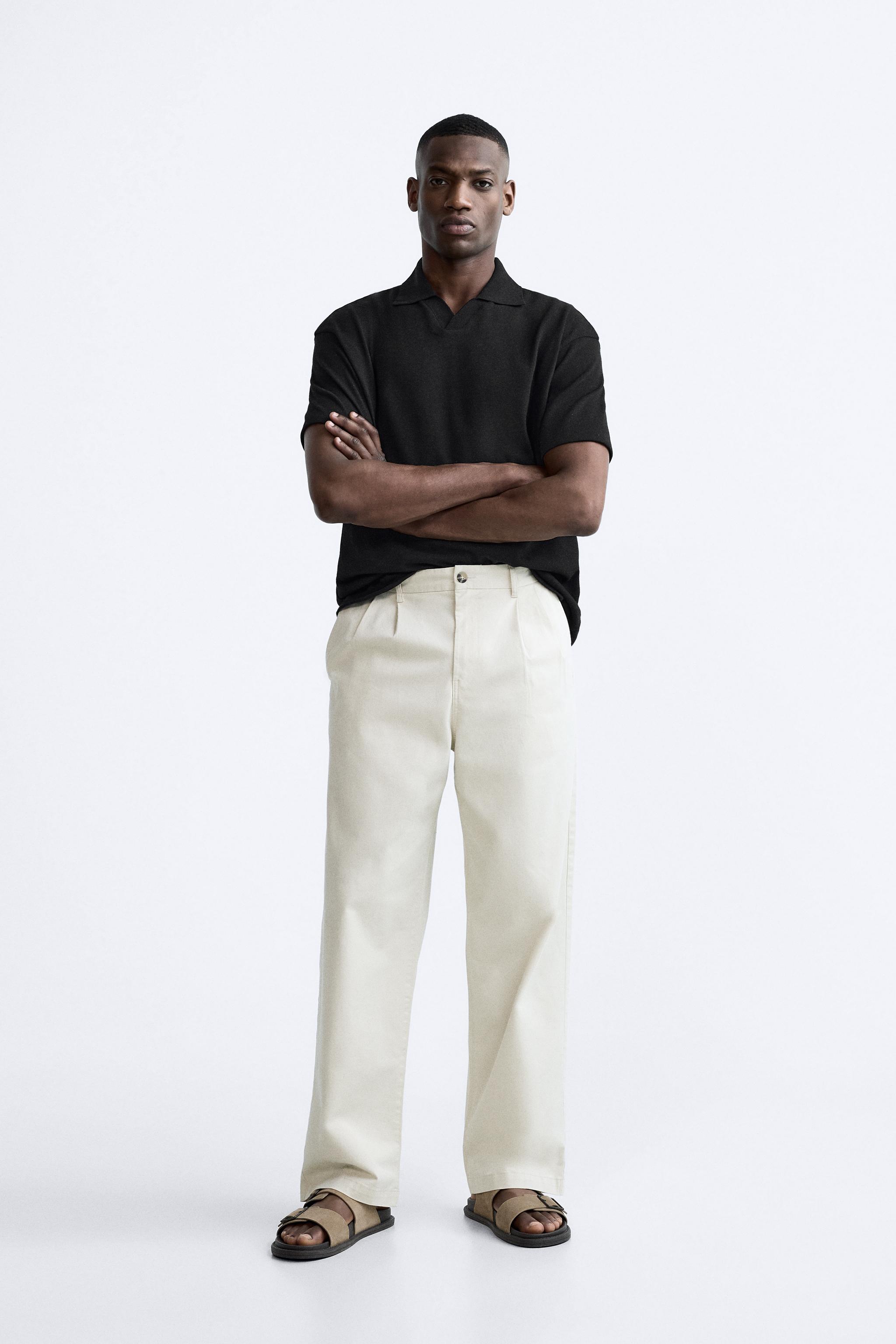 Polo negro 2025 hombre zara