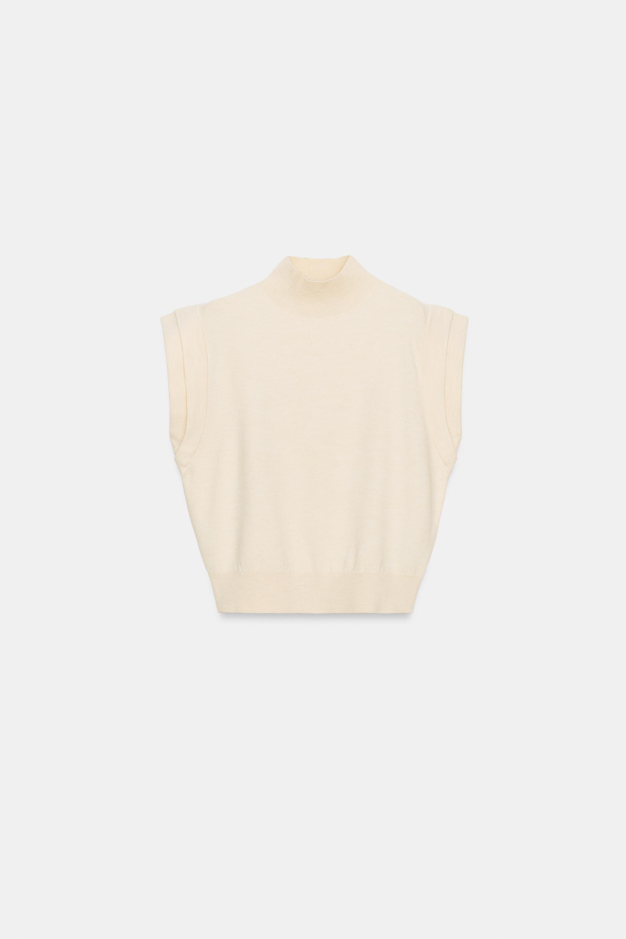 TOP EN MAILLE AVEC ÉPAULES MARQUÉES