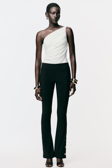 FLARE LEGGINGS WITH BUTTON HEMS - Black by Zara - Image 0