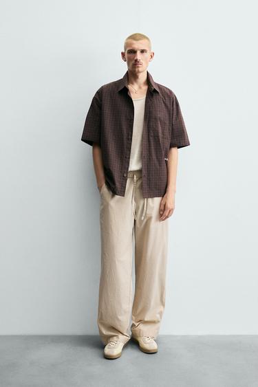 RELAXED FIT STRIPED TROUSERS - striped by Zara - Image 0