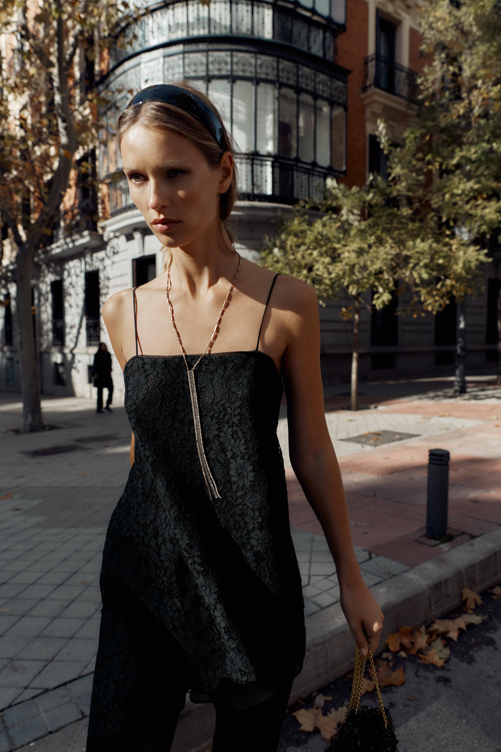 ASYMMETRIC LACE LONG TOP