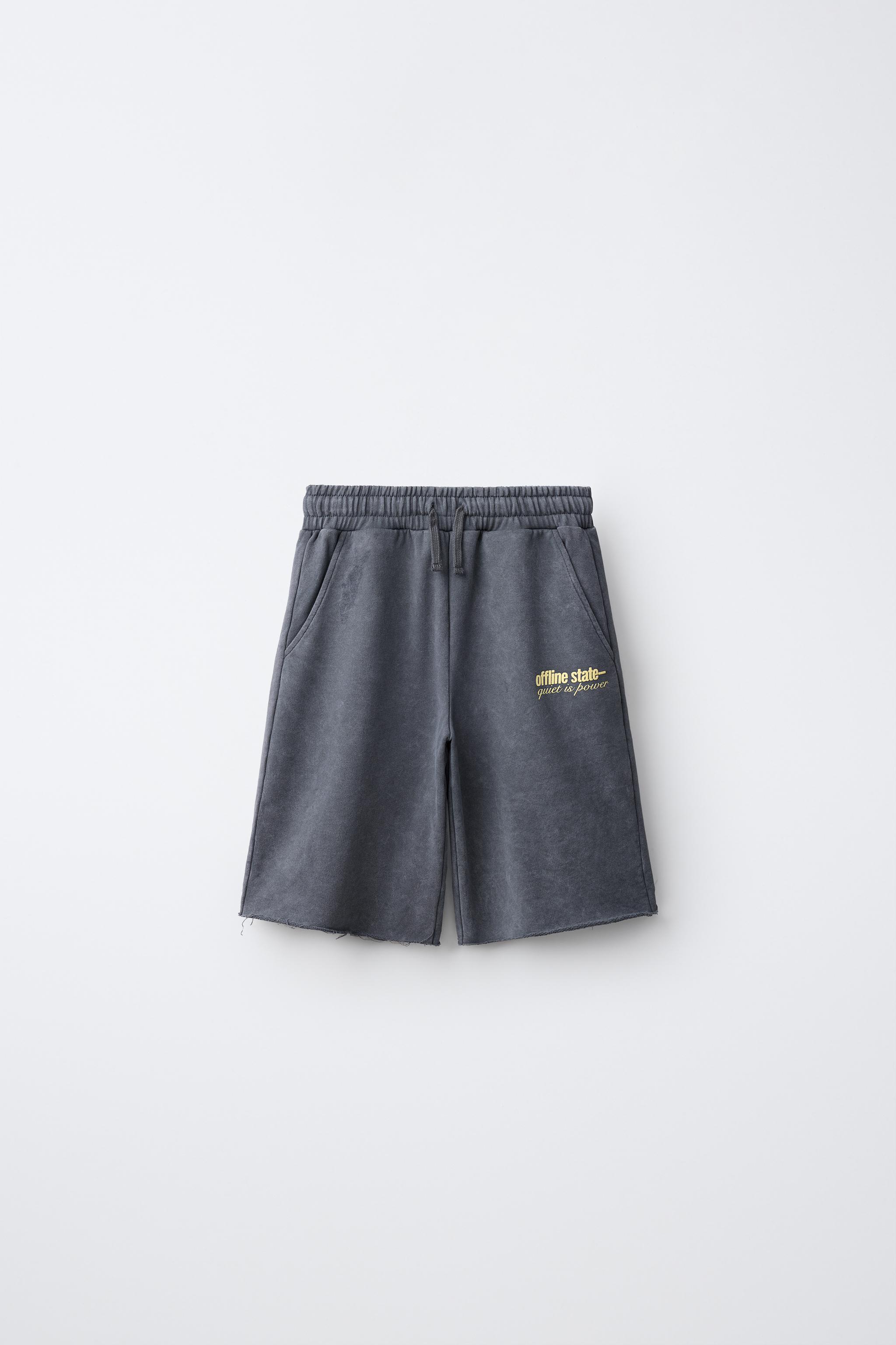 SHORT LONG À INSCRIPTIONS