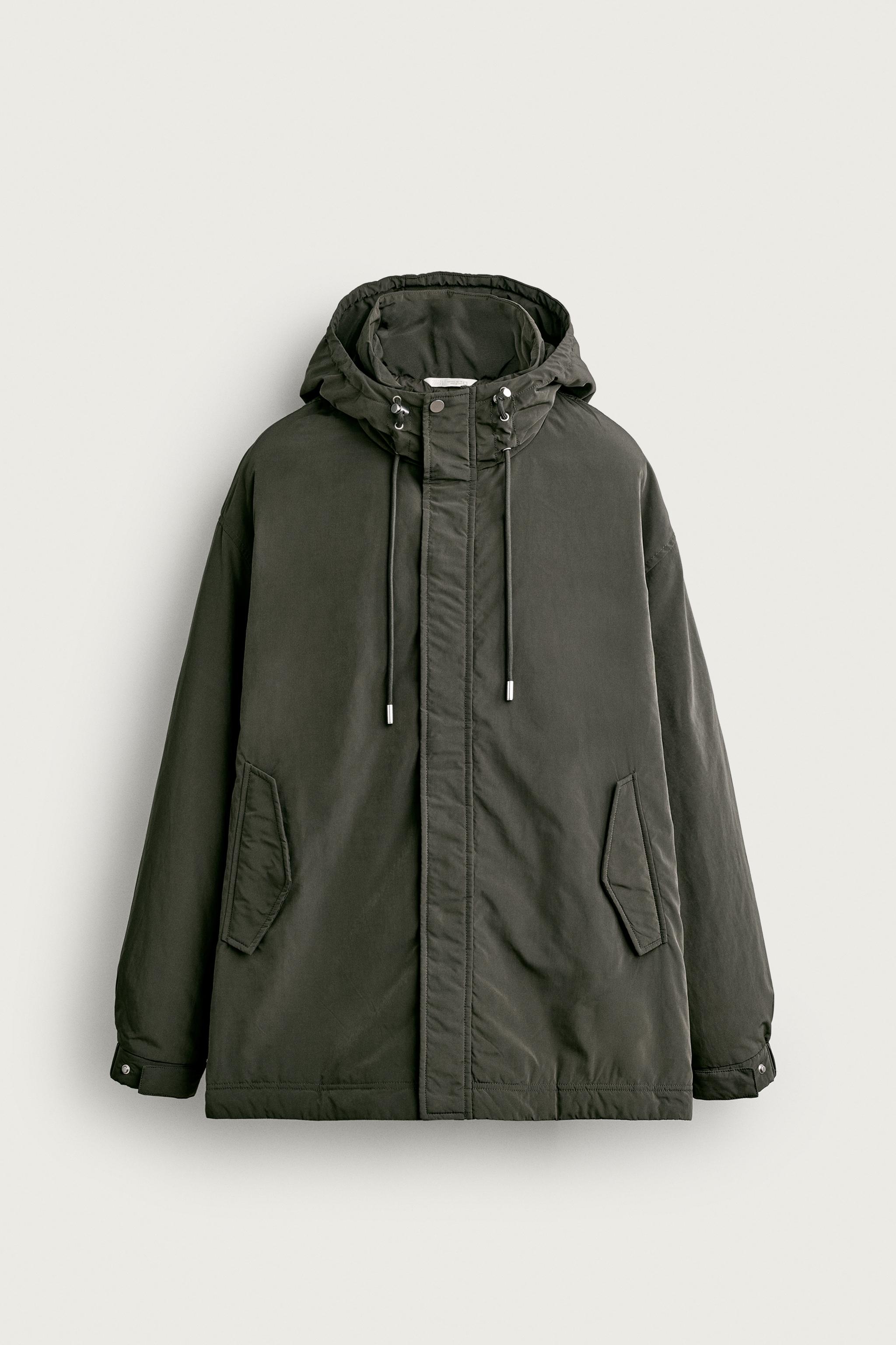 BLOUSON TECHNIQUE À CAPUCHE DÉPERLANT