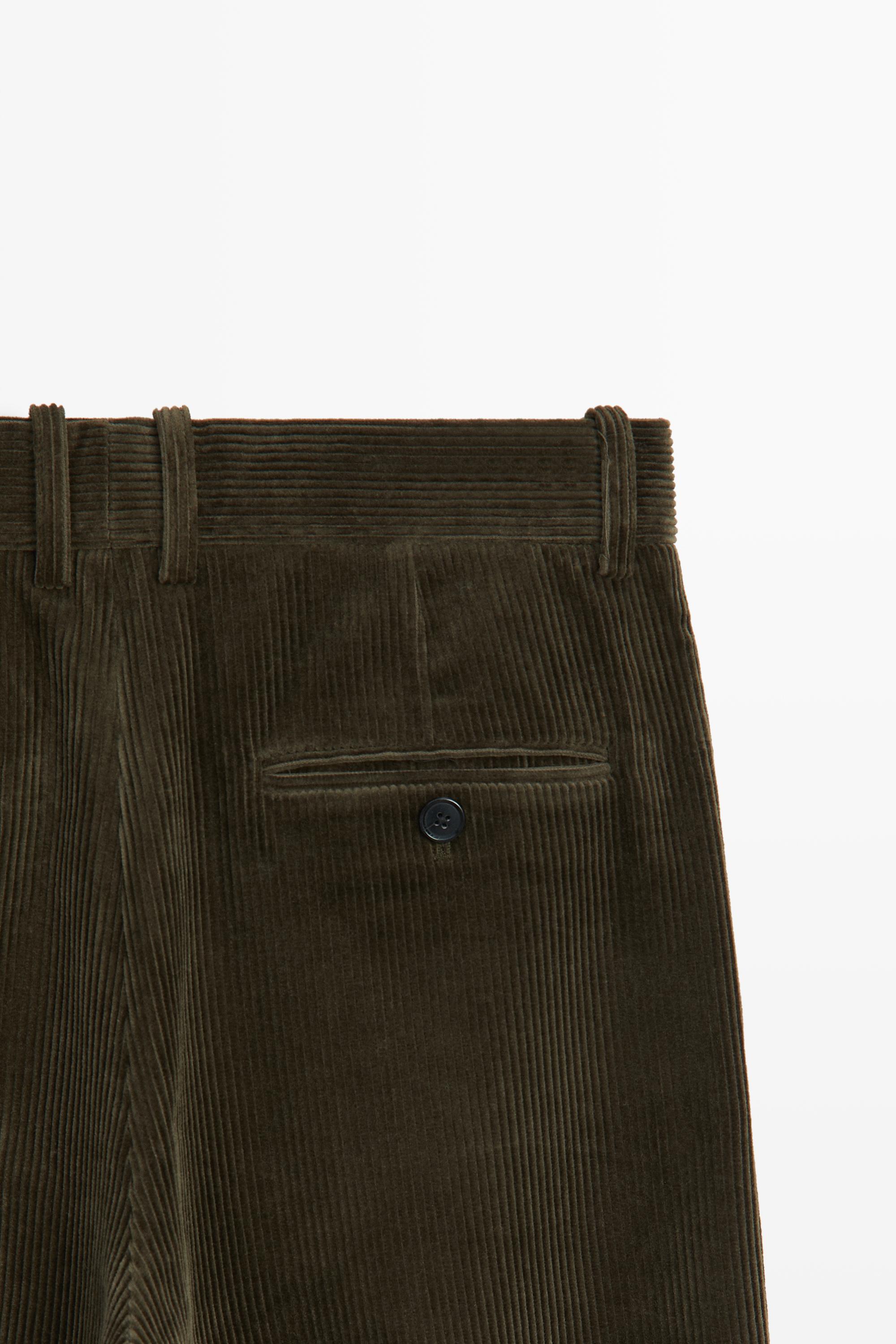 Pantalon large à pinces en velours côtelé