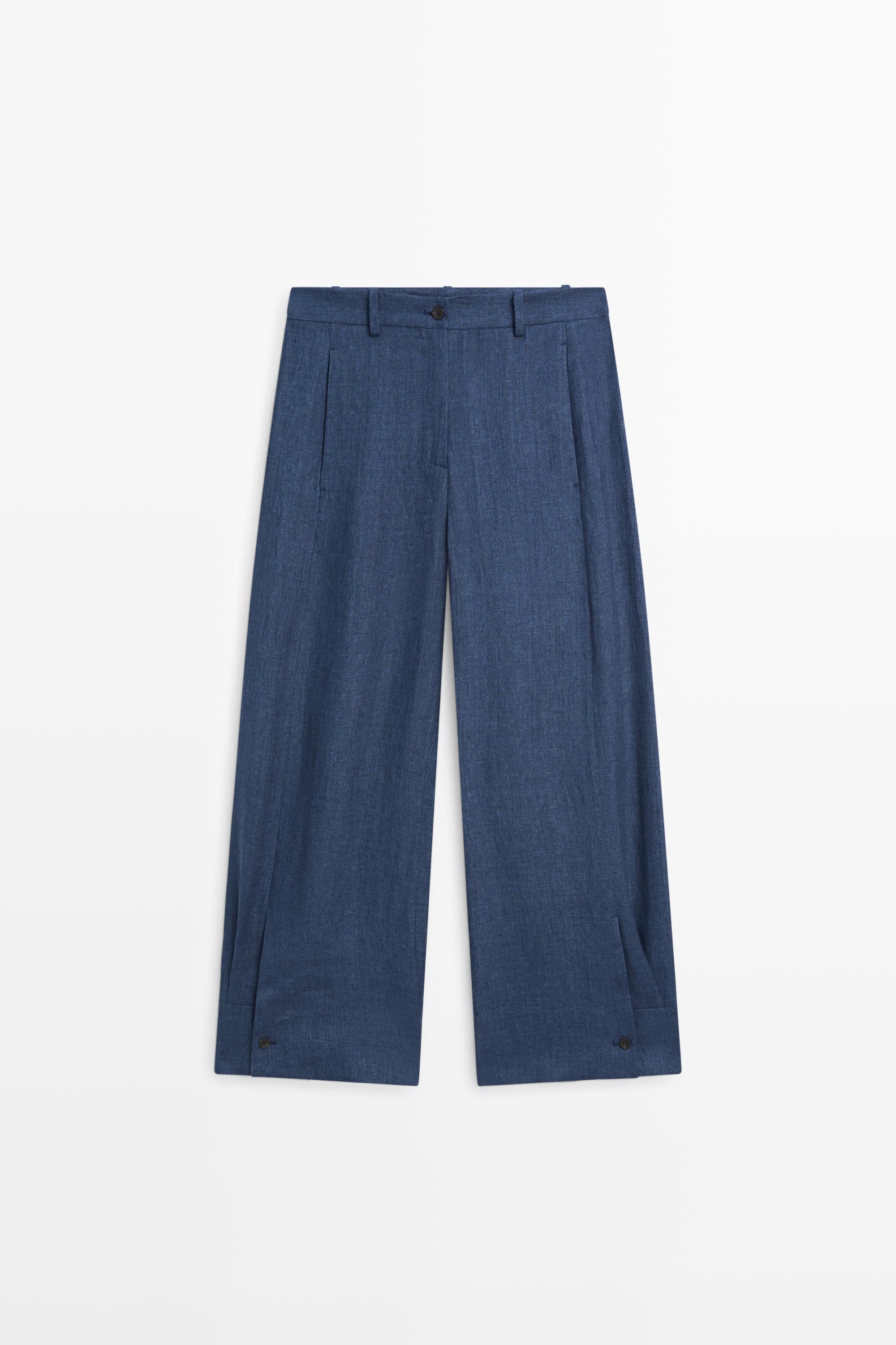 Total look linen pants with buttoned hems