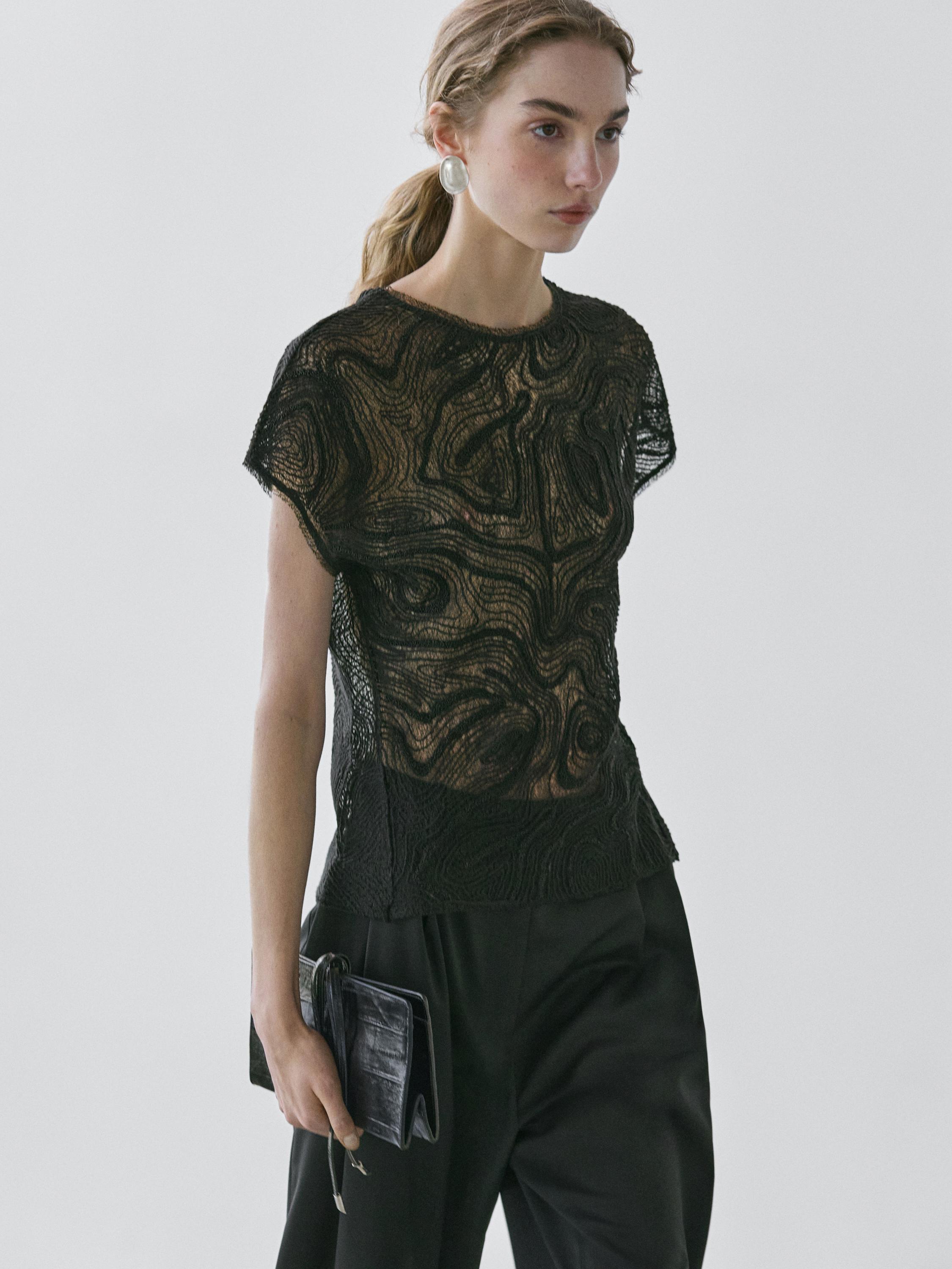 Semi-sheer embroidered top
