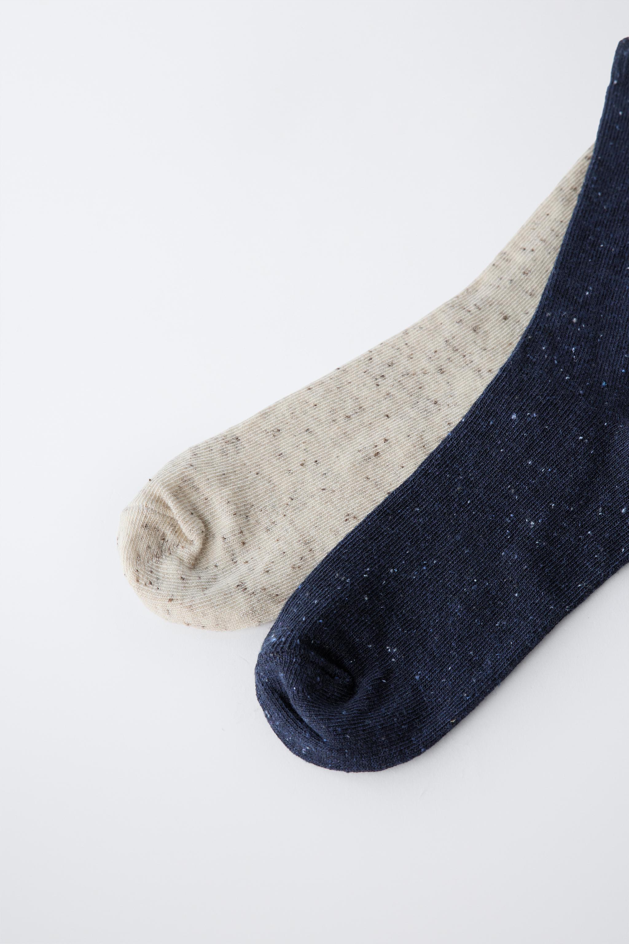 TWO-PACK OF LONG BUTTON-PRINT SOCKS