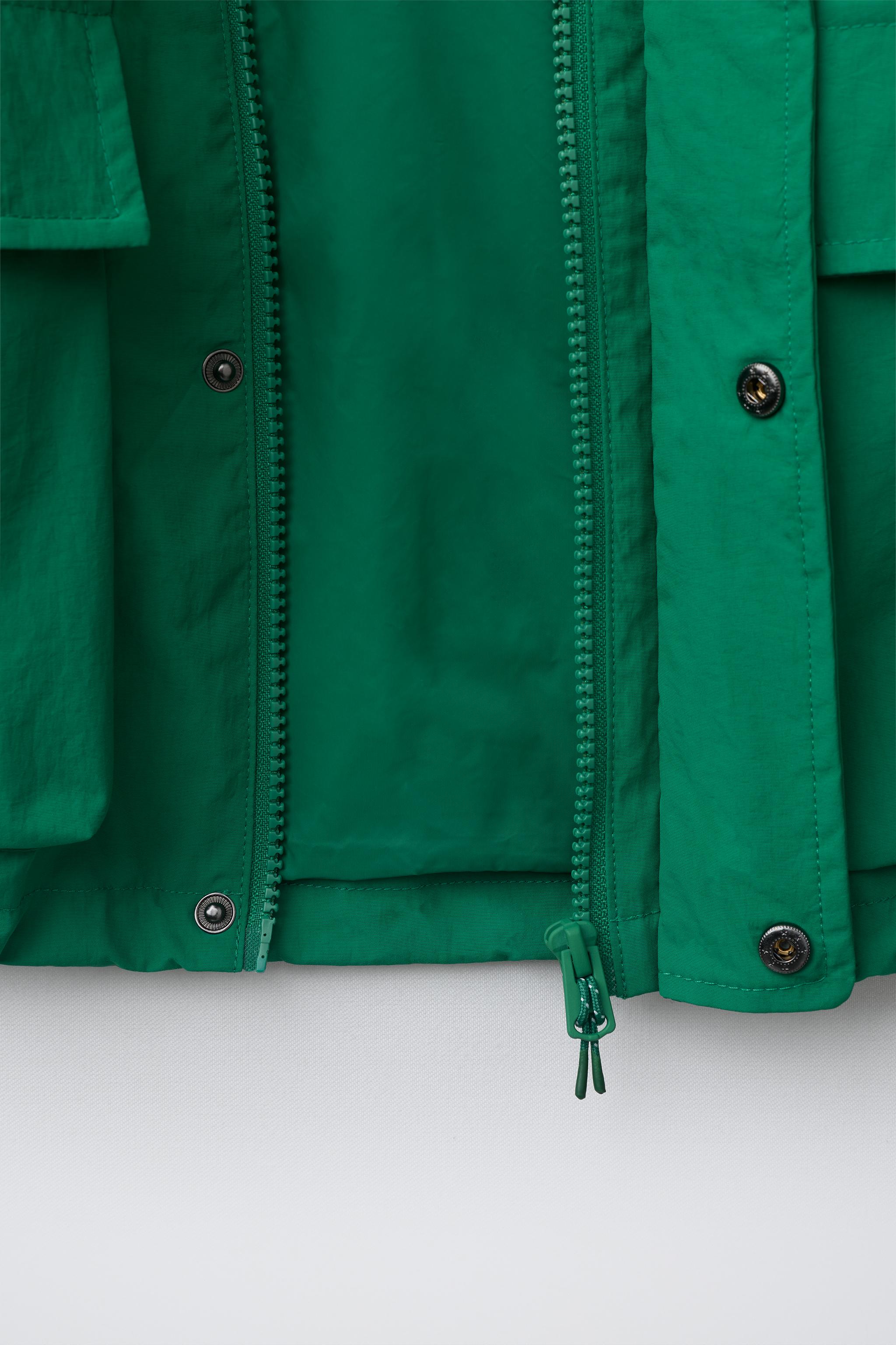 BLOUSON À CAPUCHE DÉPERLANT
