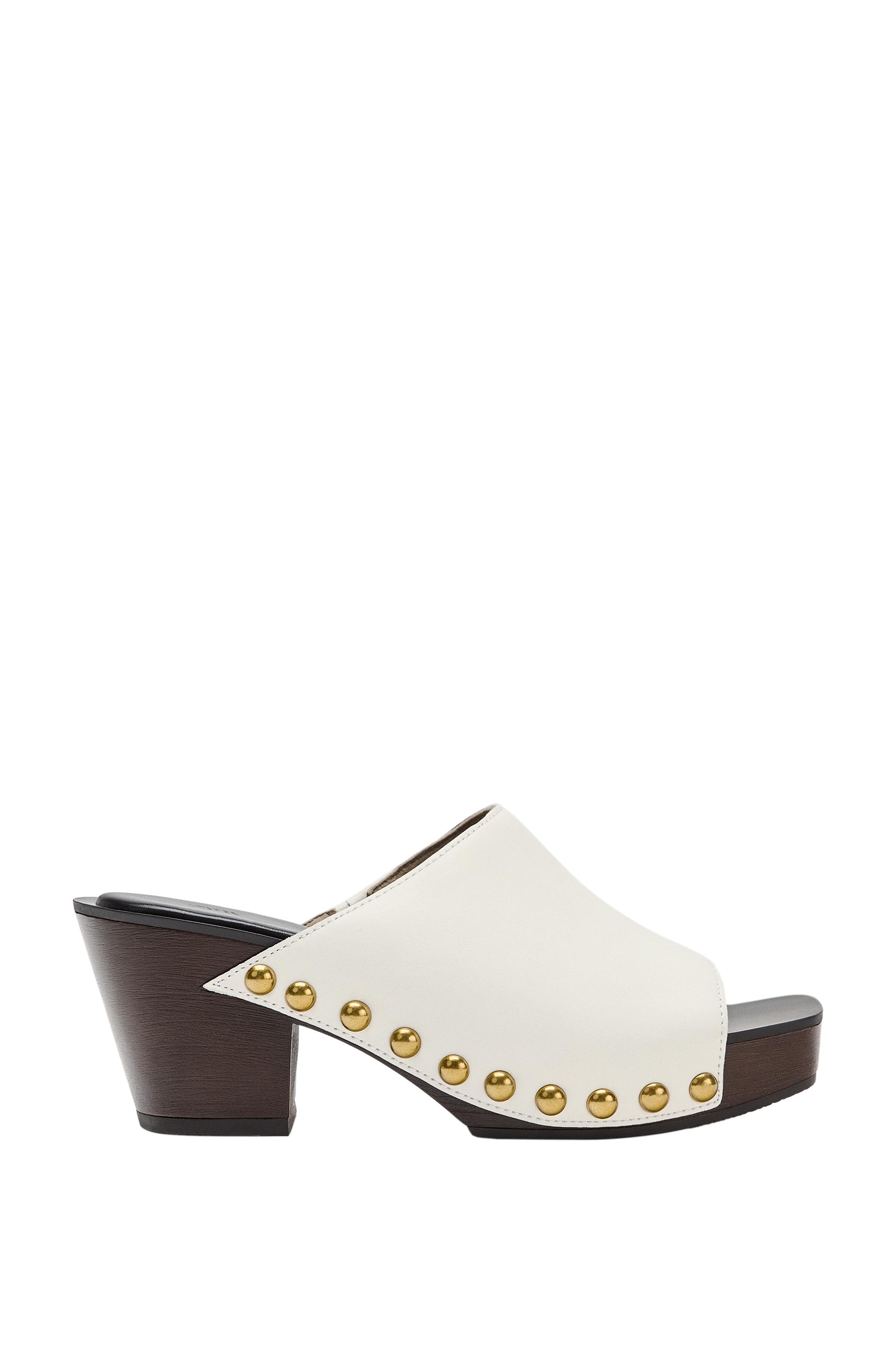 CUÑA PIEL DETALLE TACHAS LIMITED EDITION