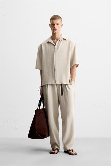 FLOWING PLEATED TROUSERS - Light beige by Zara - Image 0