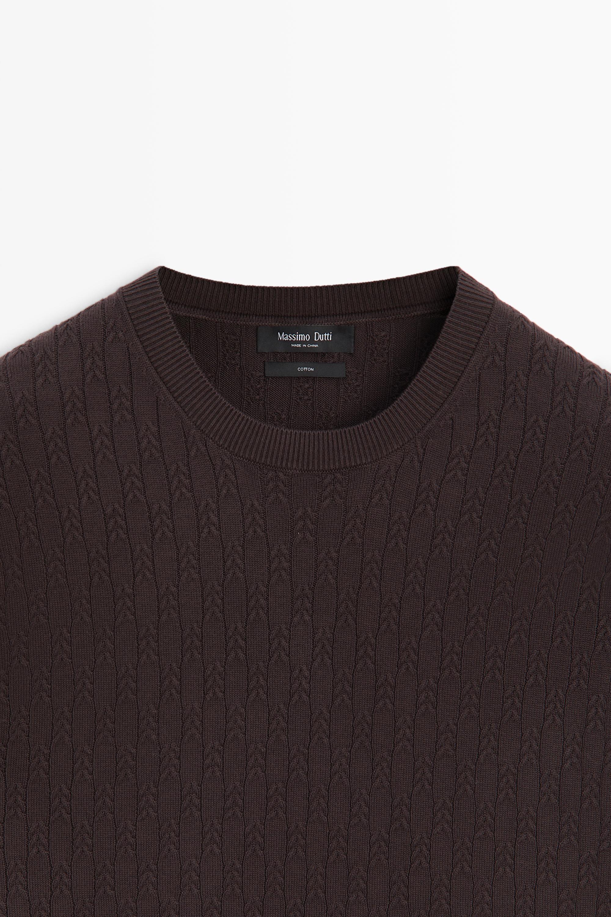100% cotton cable-knit sweater