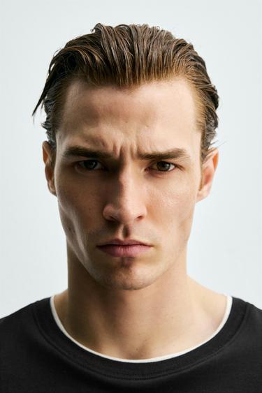 SAMARRETA AMB ACABATS DOBLES A CONTRAST - Negre de Zara