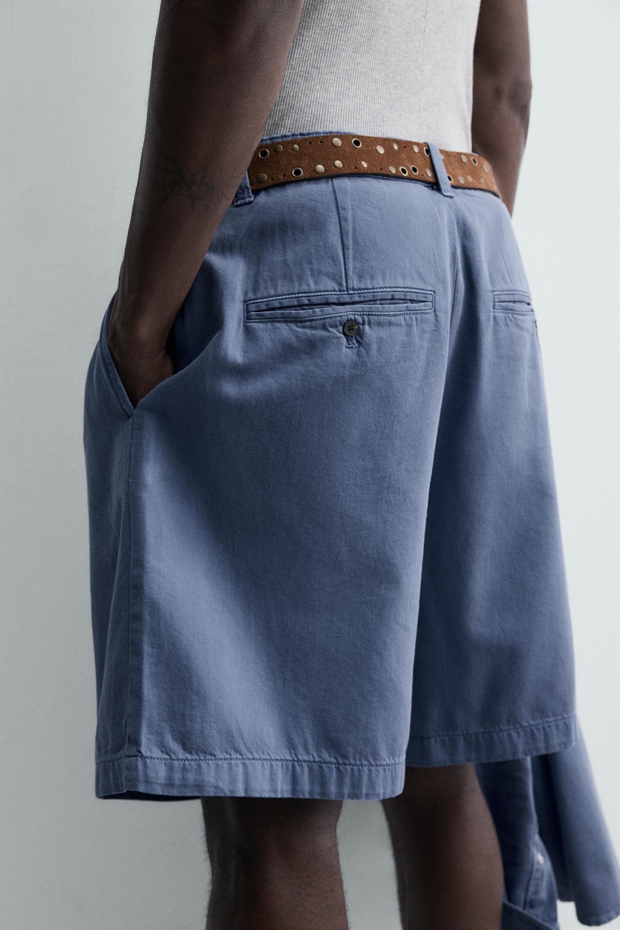 SHORT DÉLAVÉ À PLIS