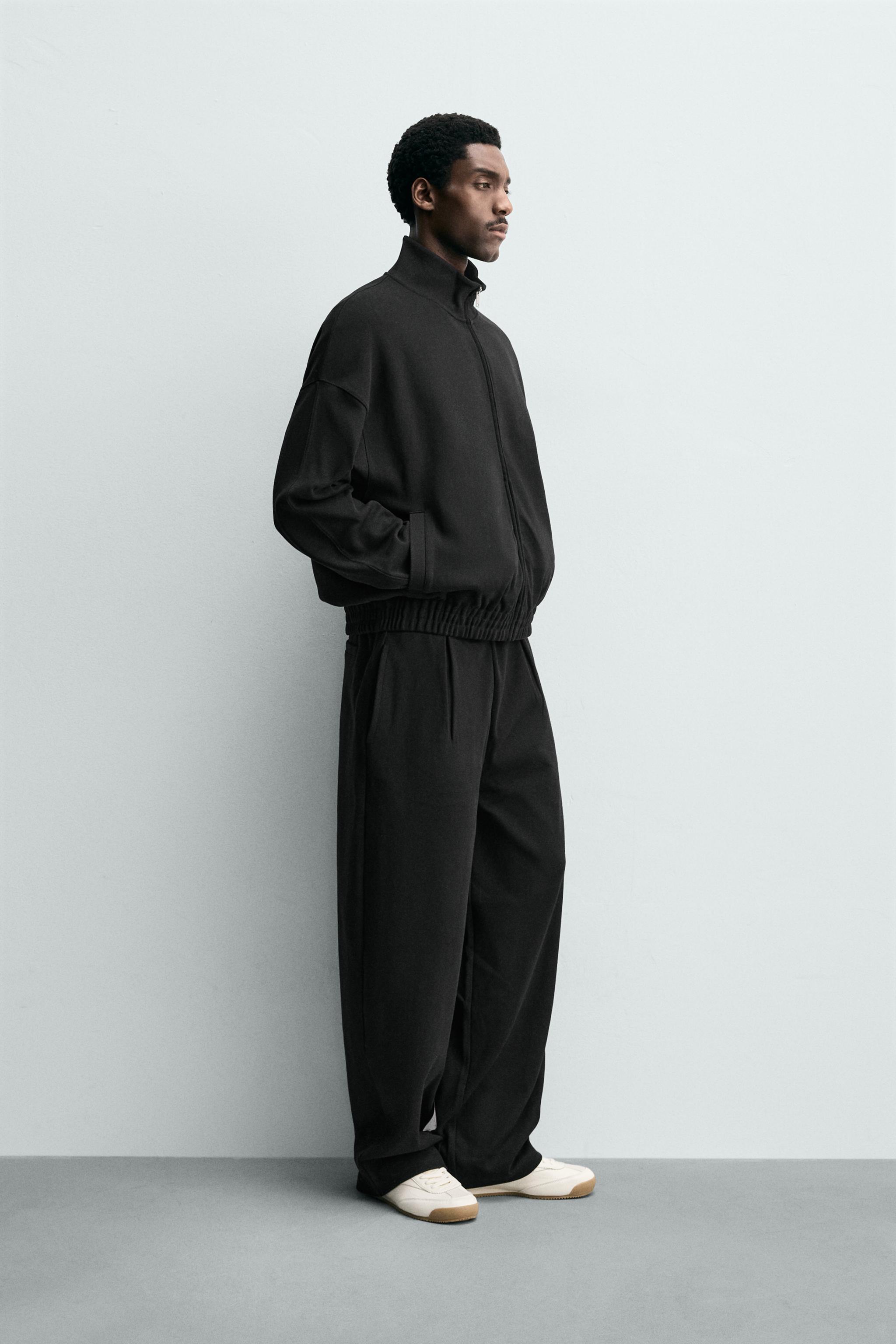 PLEATED WIDE FIT JOGGER PANTS