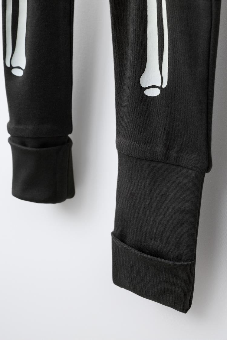 Pijama entero pie convertible esqueleto glow in the dark