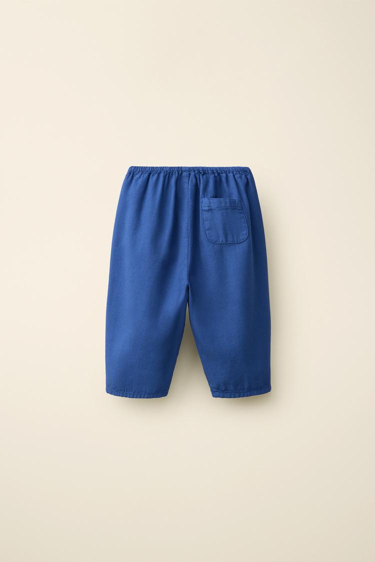 Pantalón de lona creado por Caramel London x Zara 4