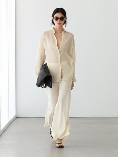 Pantalón fluido wide leg total look - Amarillo de Zara