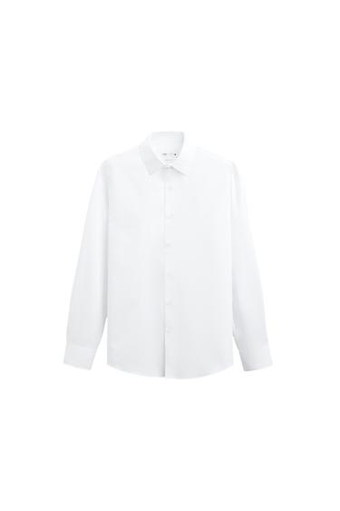 Front view of a white button-down shirt with a classic collar.