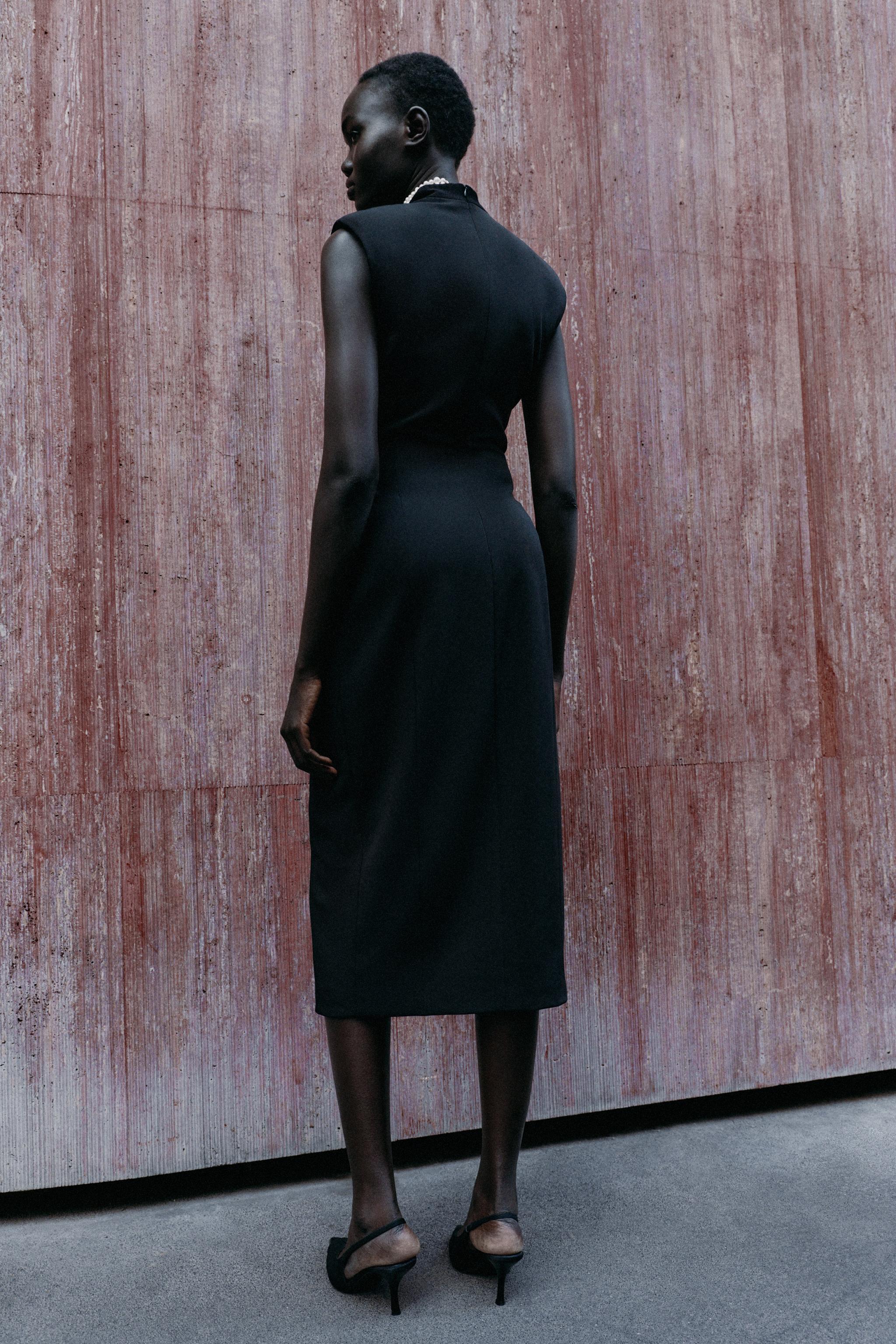 MIDI SLEEVELESS DRESS