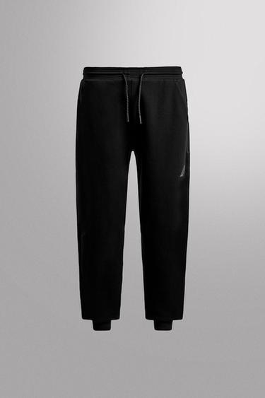 PANTALON TECHNIQUE À FERMETURE ÉCLAIR - Noir de Zara