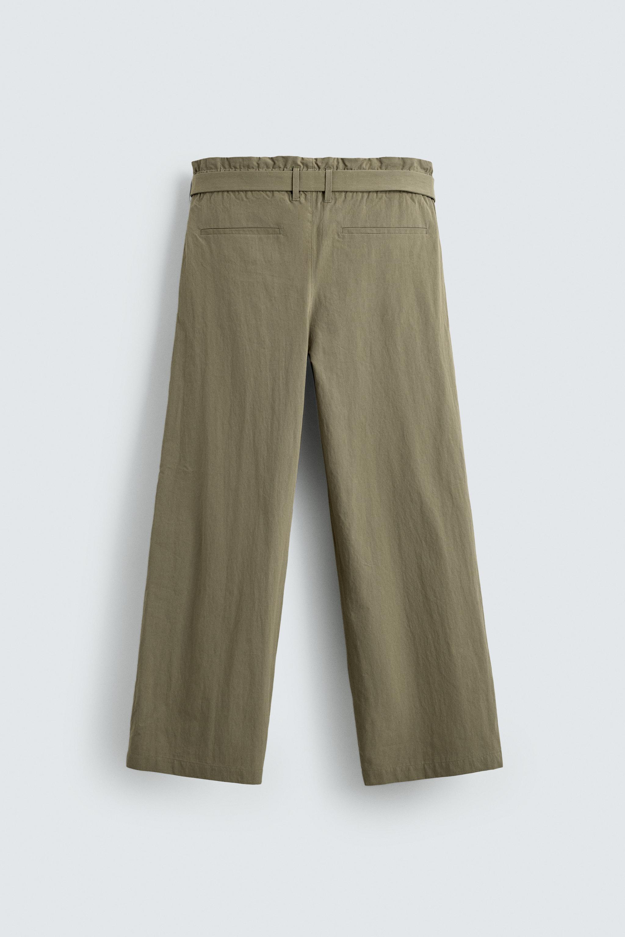 BELTED PLEATED WIDE FIT PANTS