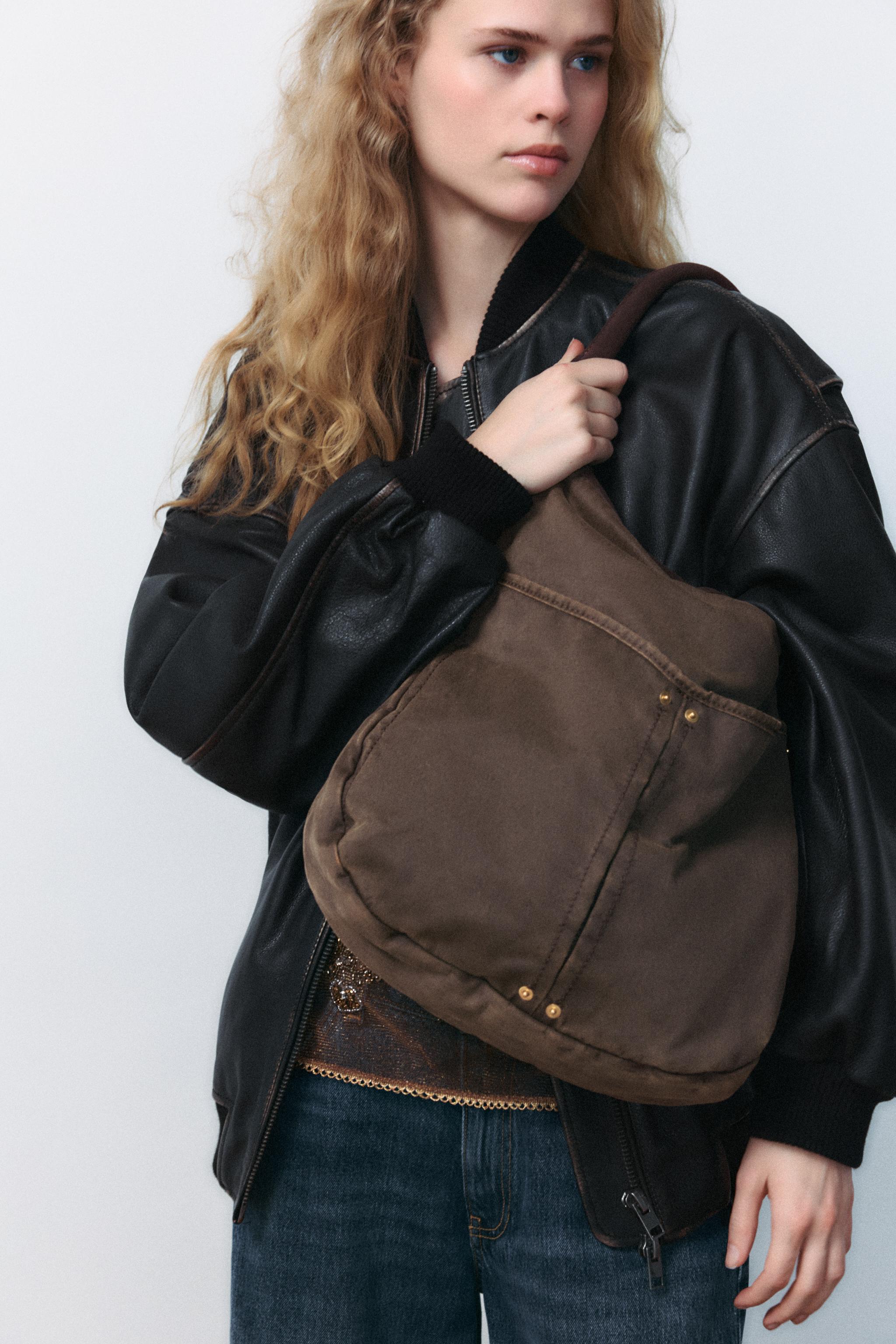 Distressed leather bag online