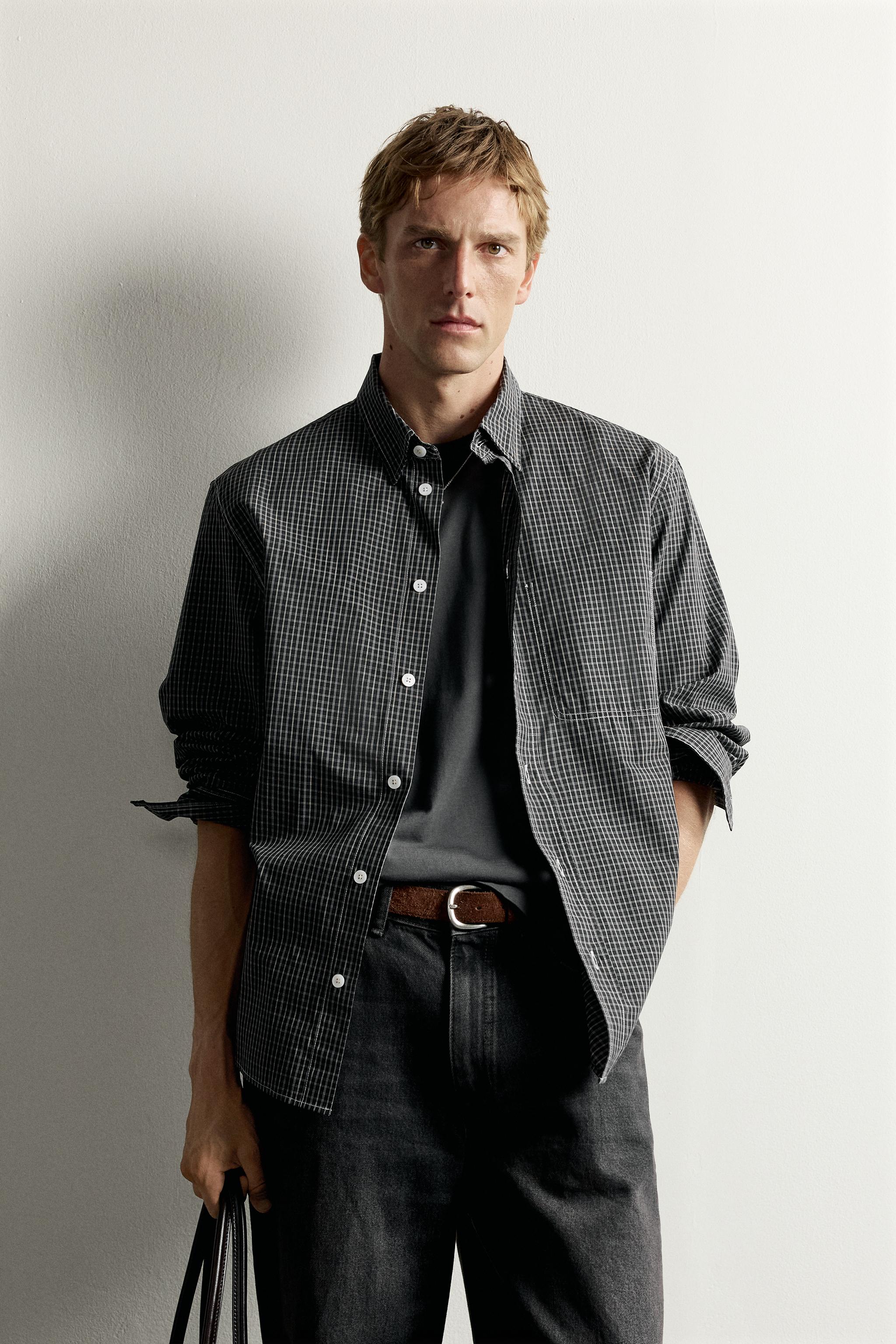 CHEMISE À CARREAUX ET SURPIQÛRES CONTRASTÉES