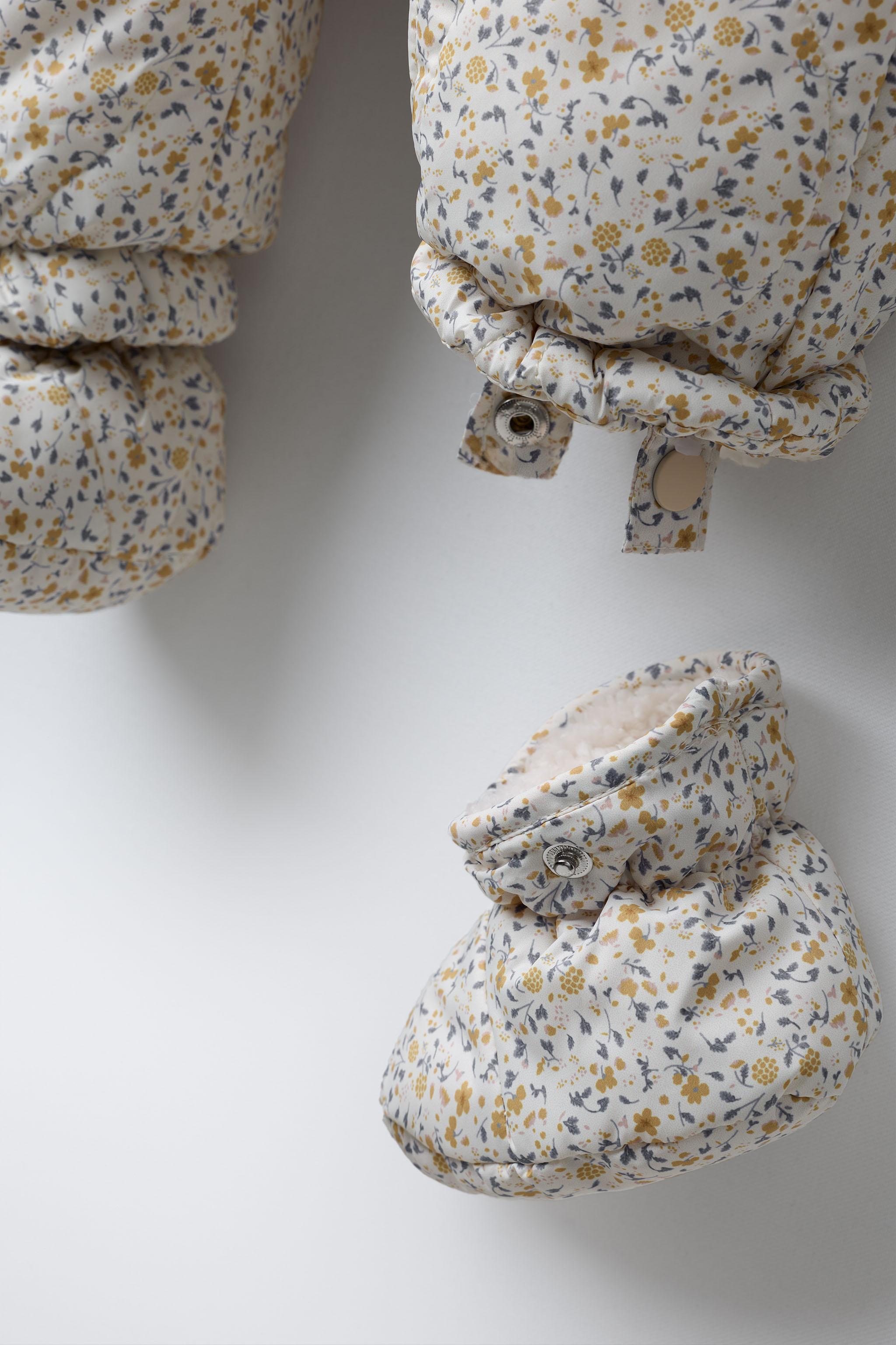 NYLON ROMPER WITH DETACHABLE MITTENS AND BOOTIES, FLORAL PRINT