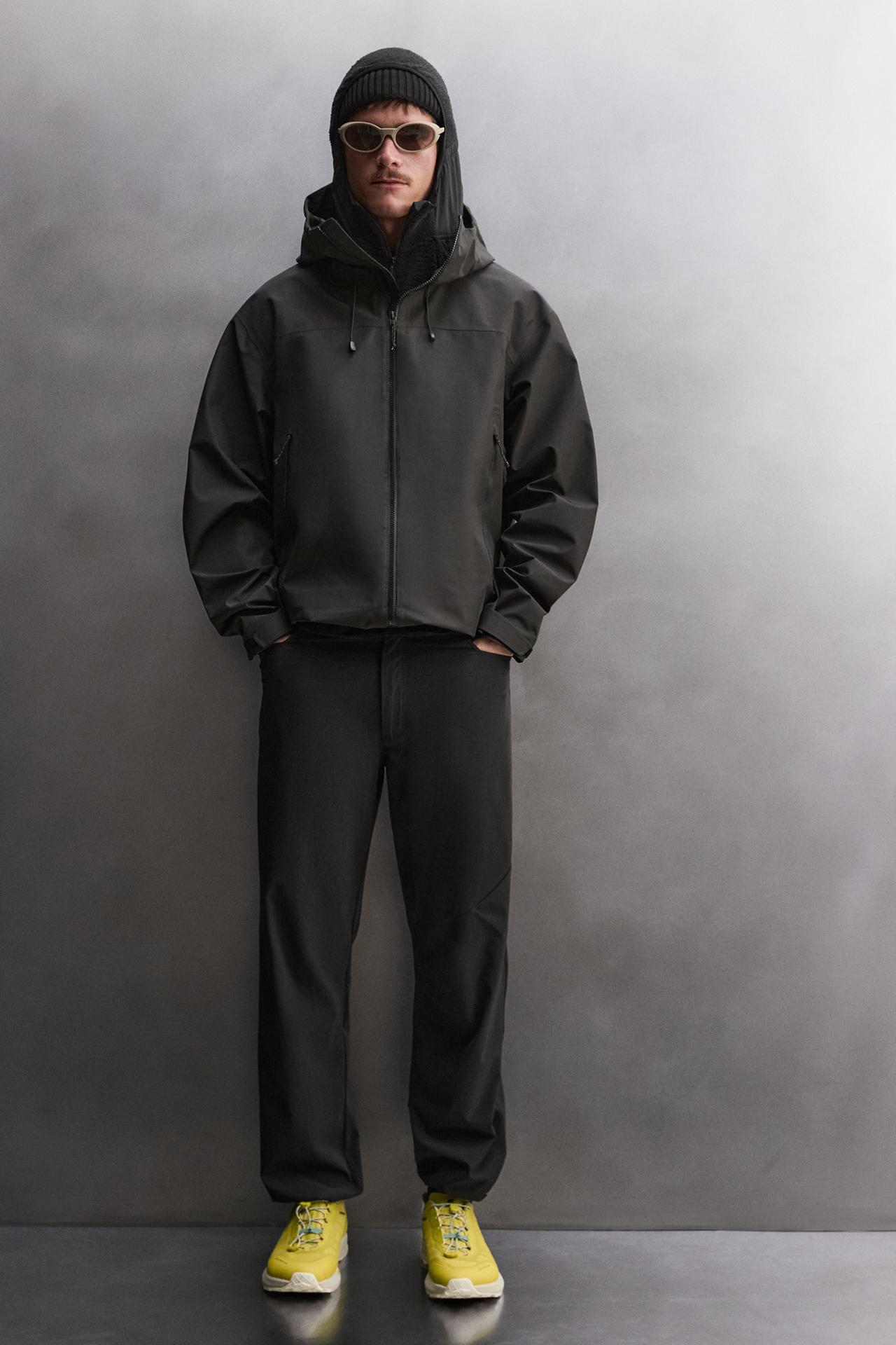 WATERPROOF TECHNICAL JACKET — Black
