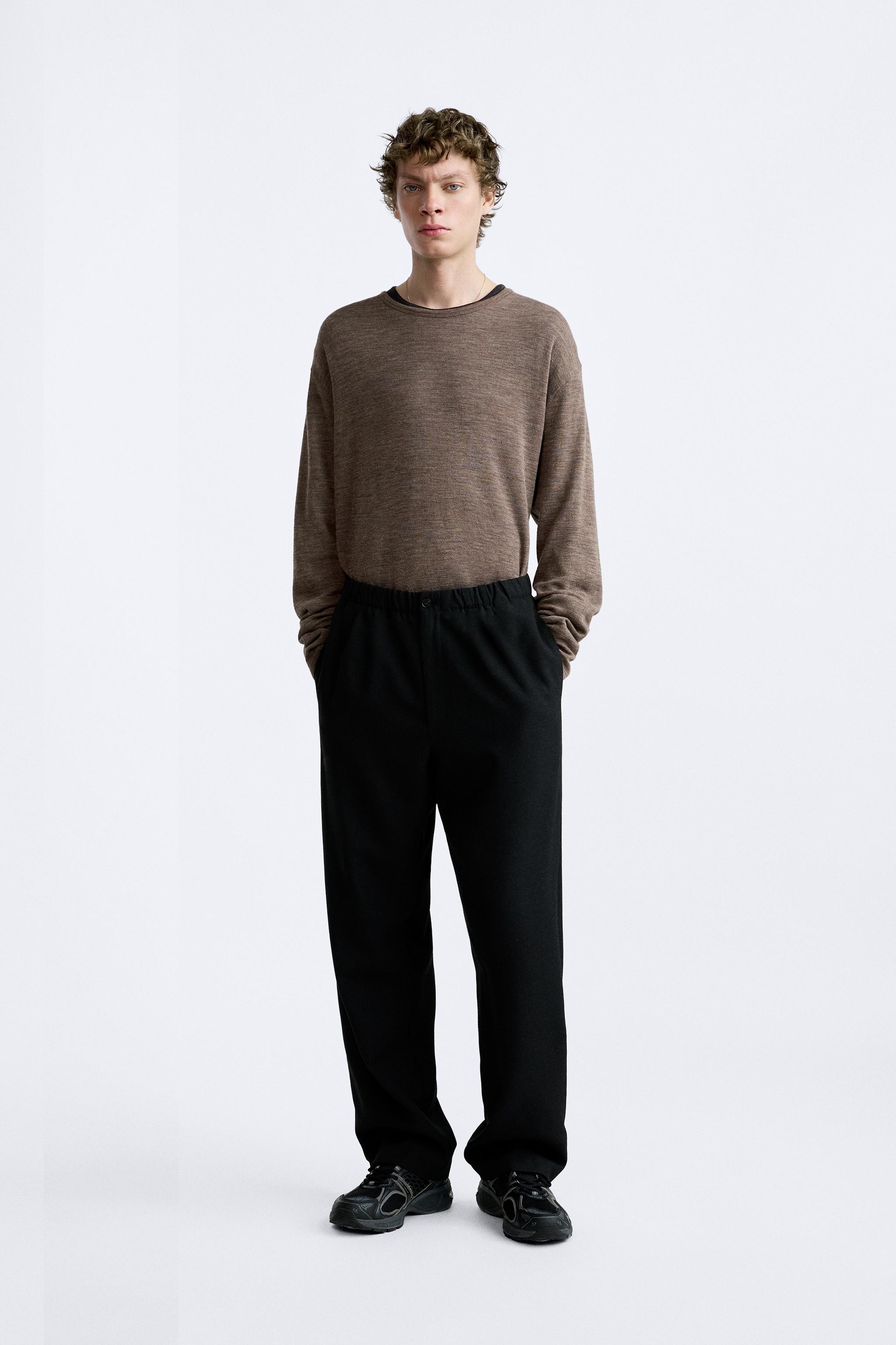 Wool blend knit top. Round neck and long sleeves., Origins special  collection.