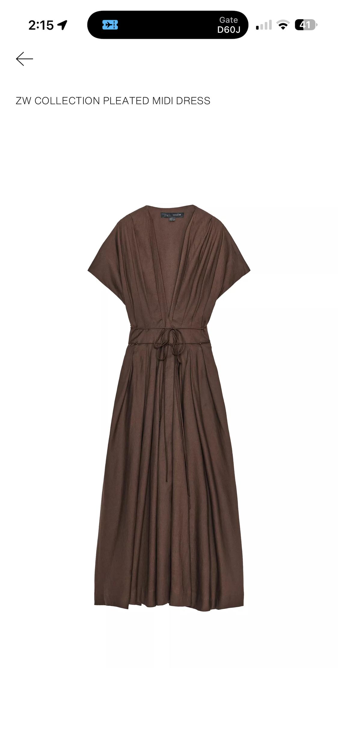 Brown pleated midi dress with short sleeves and a V-neckline. Text: 2:15 Gate D60J 41 ZW COLLECTION PLEATED MIDI DRESS.
