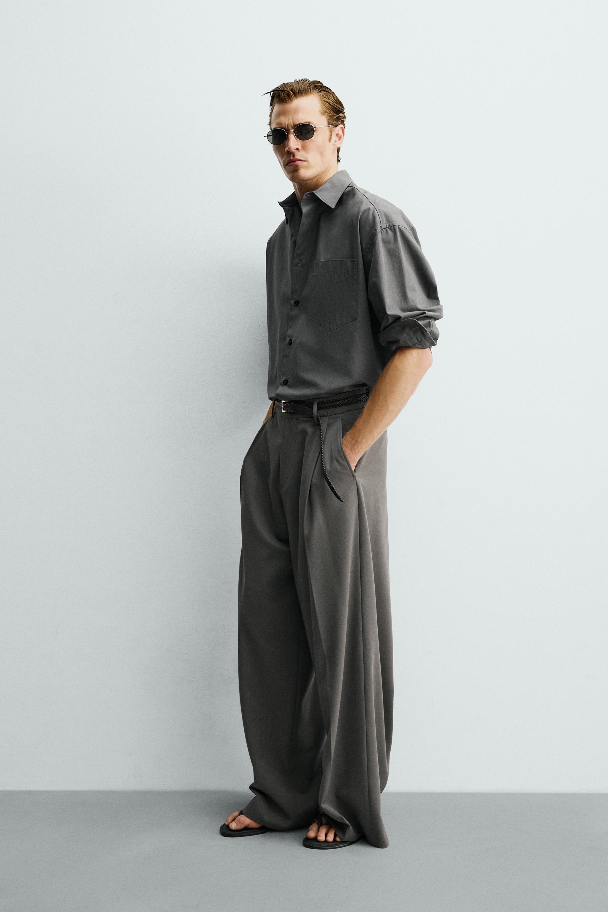 PLEATED WIDE FIT PANTS