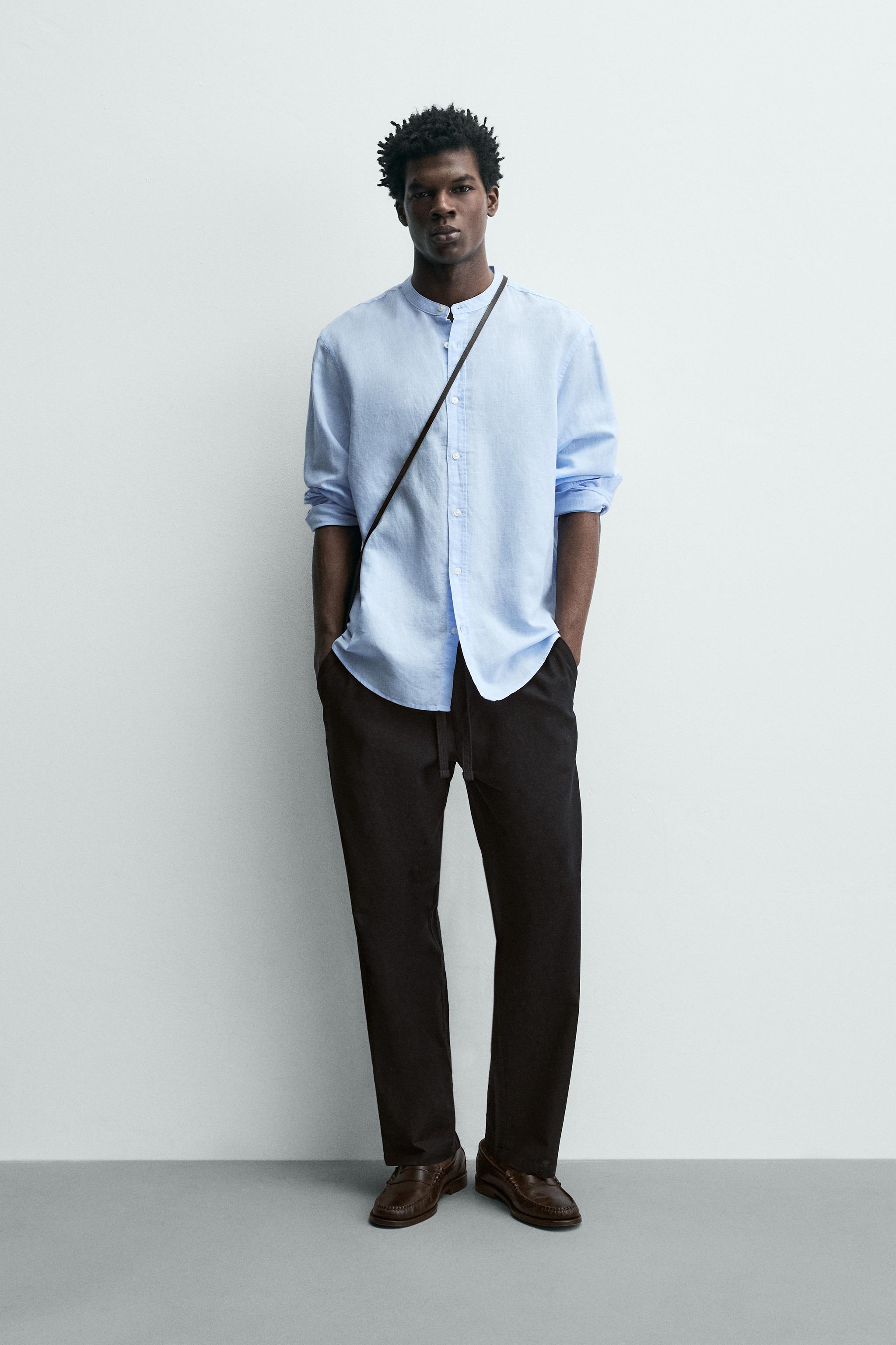 RELAXED FIT COTTON BLEND TROUSERS