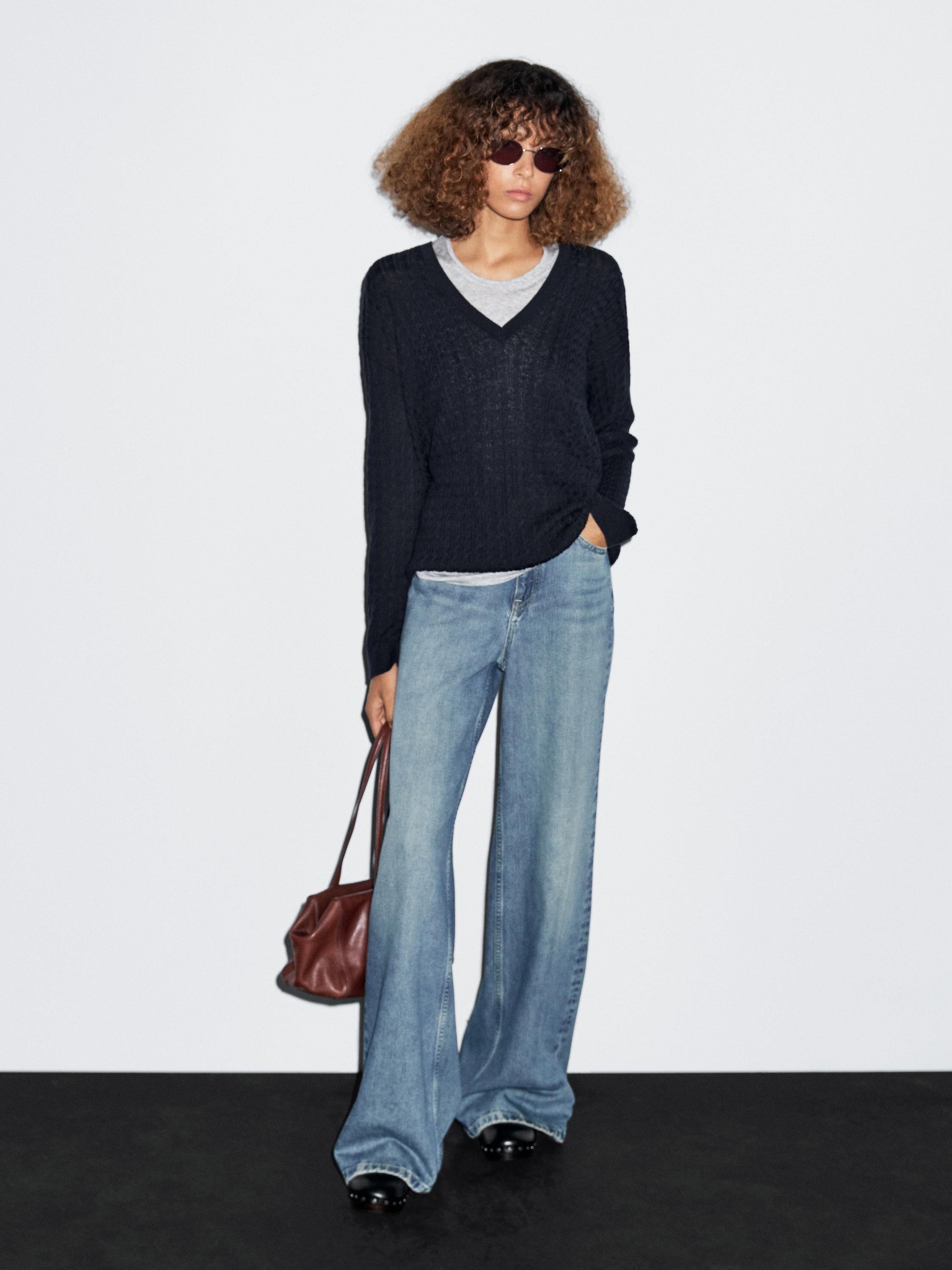 Pull en maille tressée à col V
