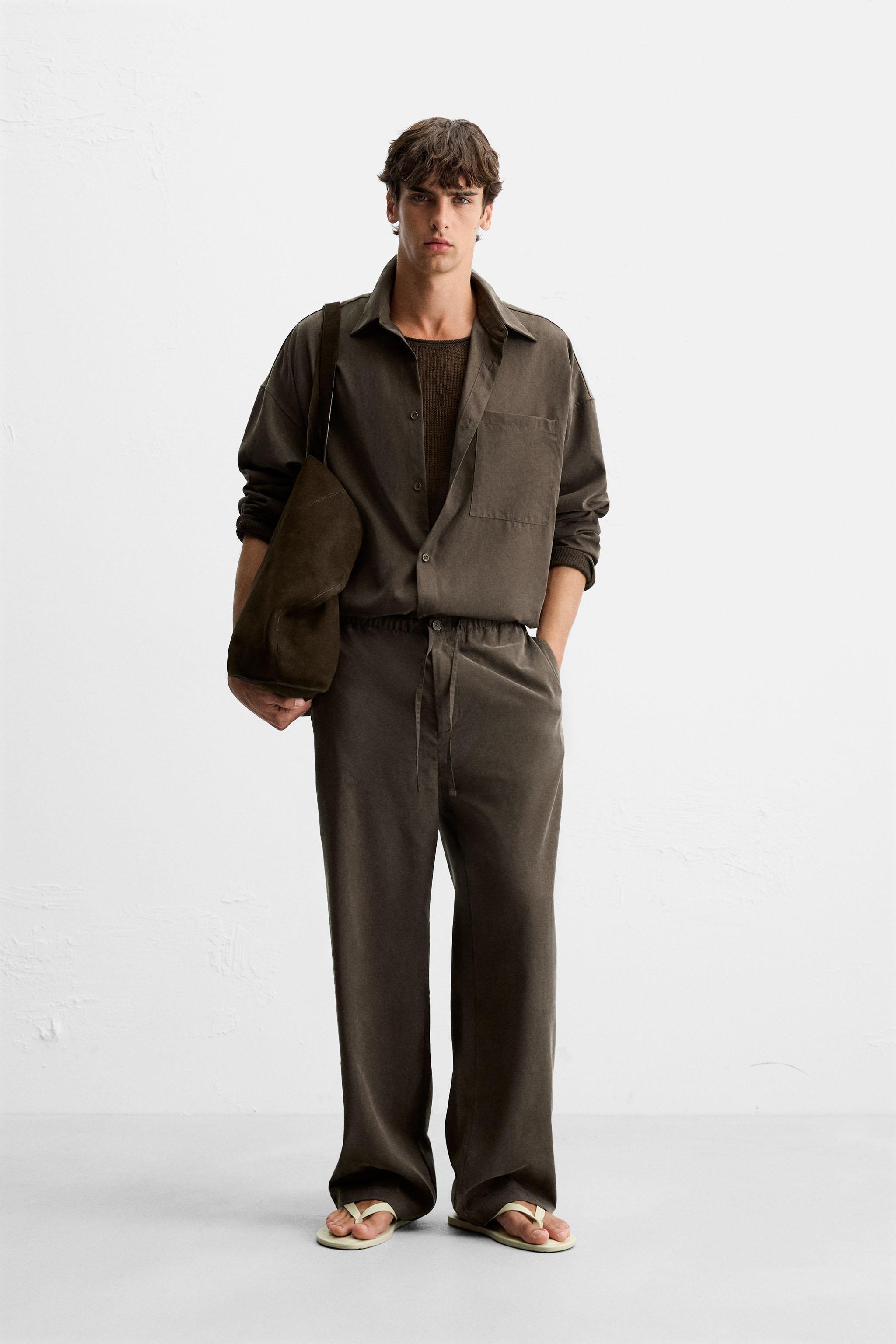 RELAXED FIT FLOWY PANTS