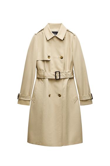 Front view of a beige trench coat with belt and double-breasted buttons.