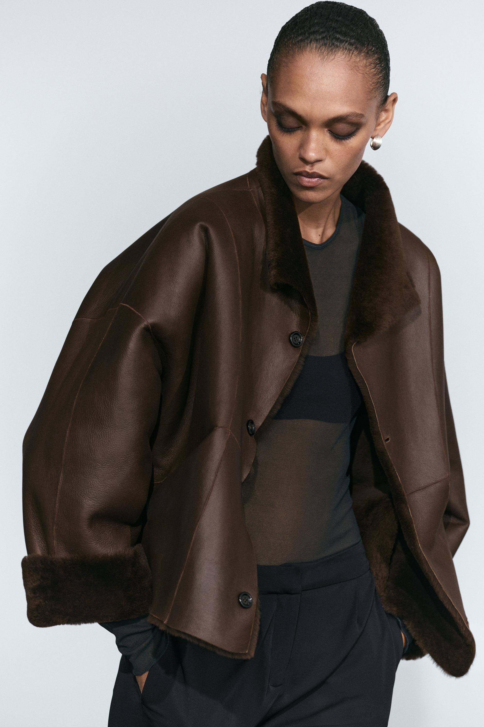 Manteau réversible en cuir avec fourrure