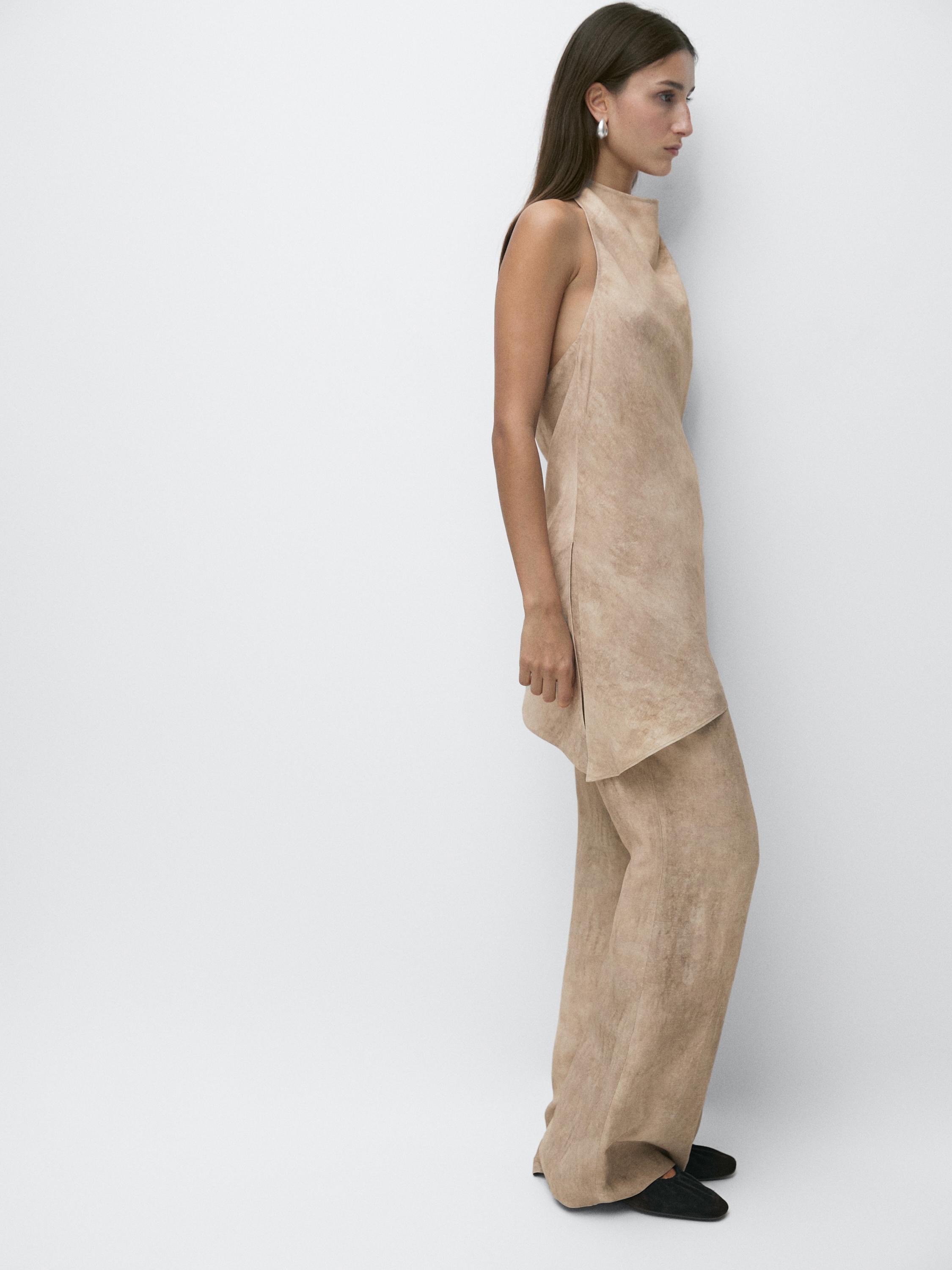 Worn effect halter top