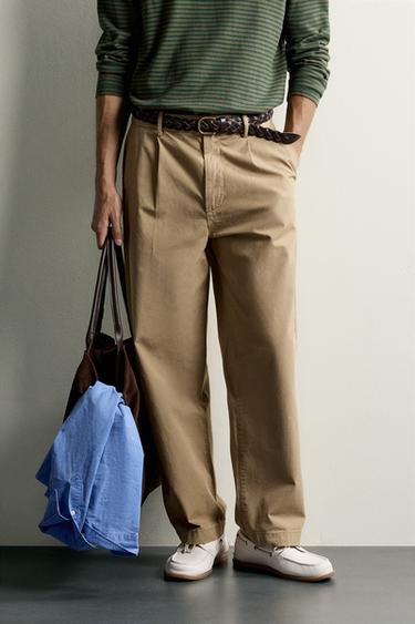 REGULAR FIT PLEATED CHINO TROUSERS - Light khaki by Zara