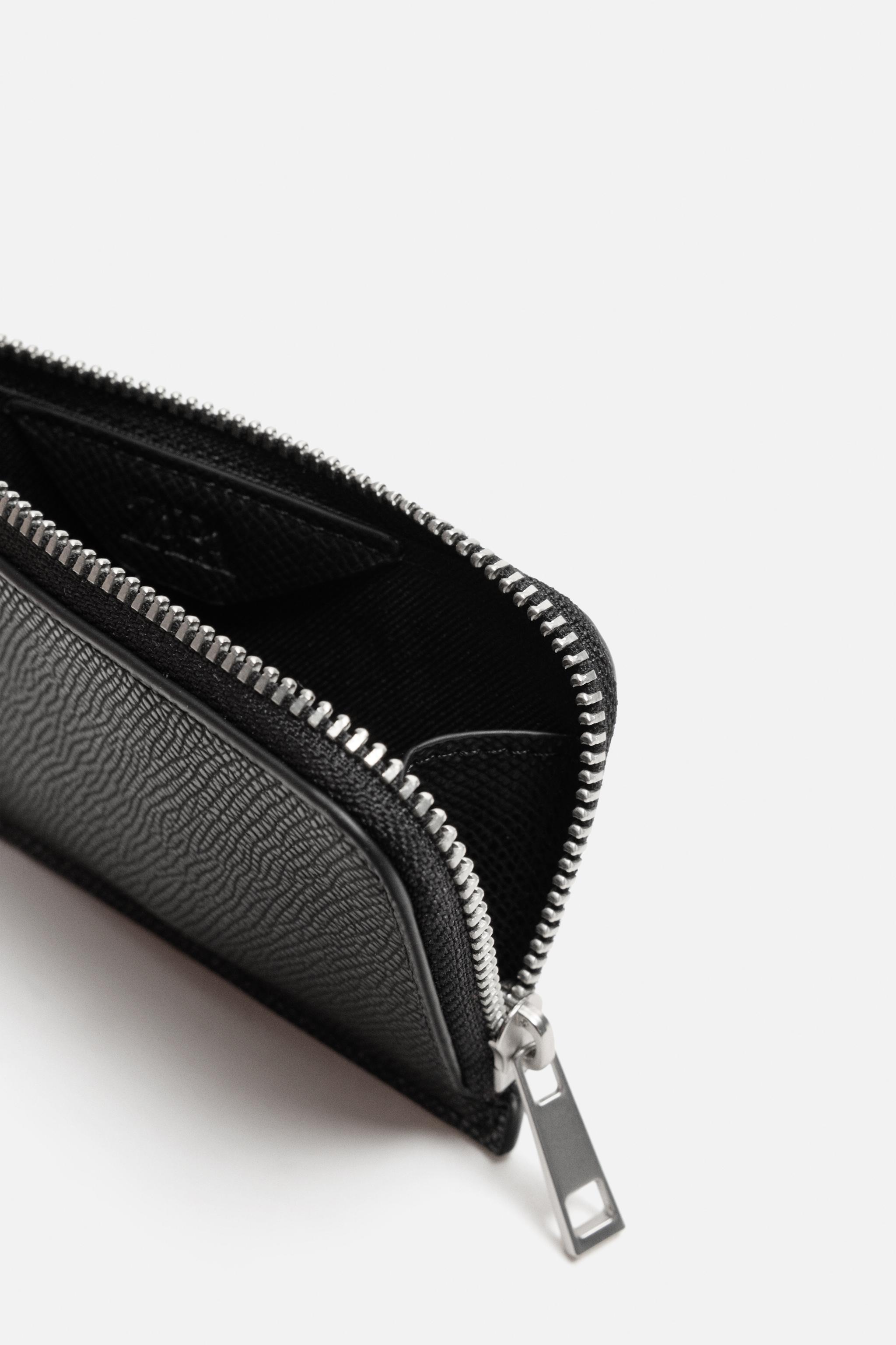 EMBOSSED CARDHOLDER